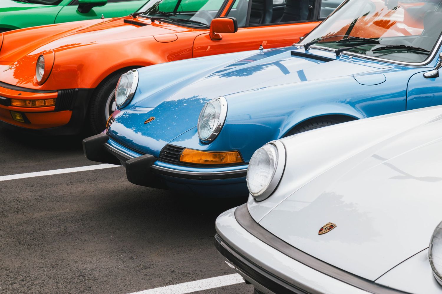 3 Porsches lined up at Porsche Cars and Coffee in Beaverton Oregon