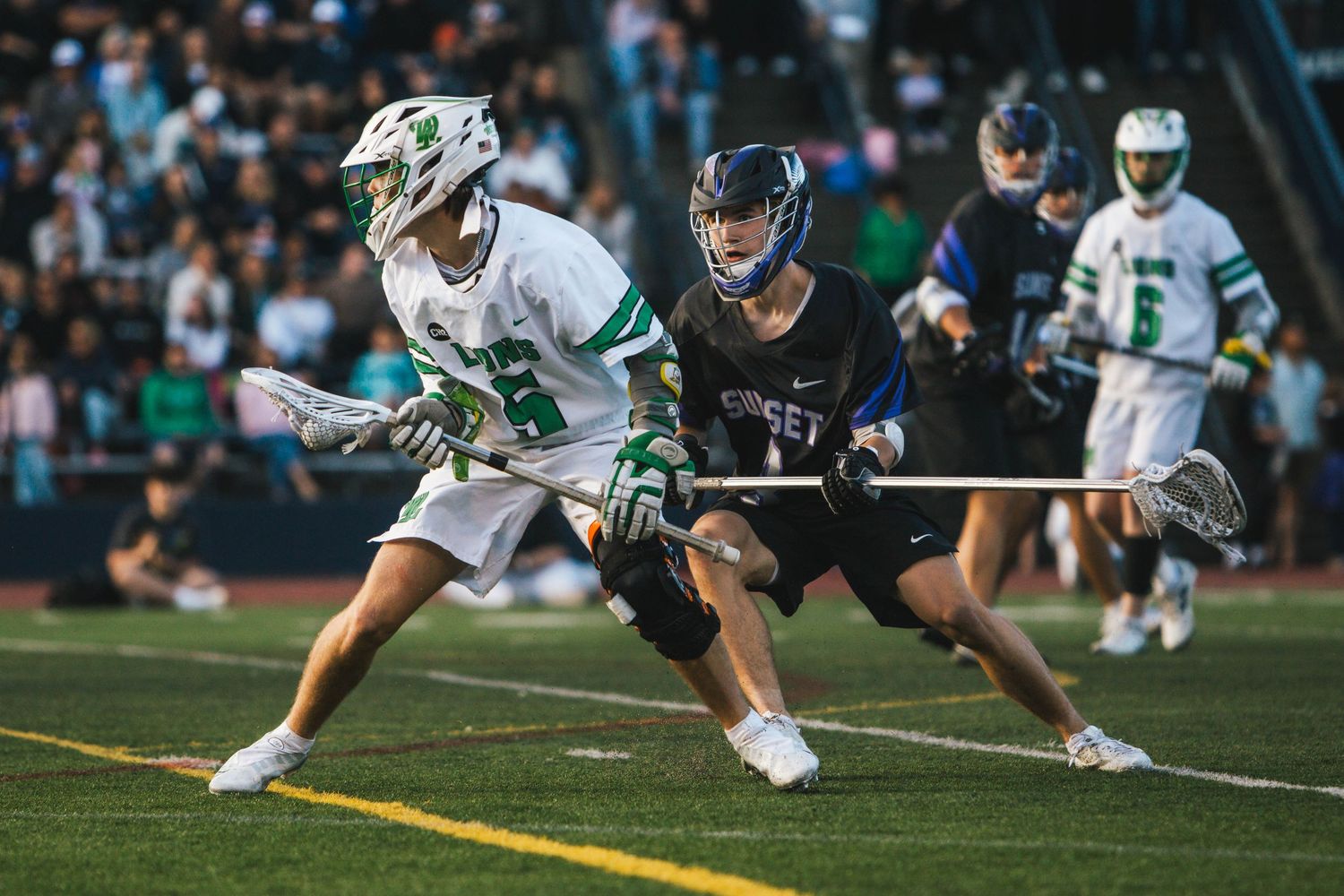 West Linn Lions Varsity Lacrosse fighting for a title at Lake Oswego High School in Oregon.
