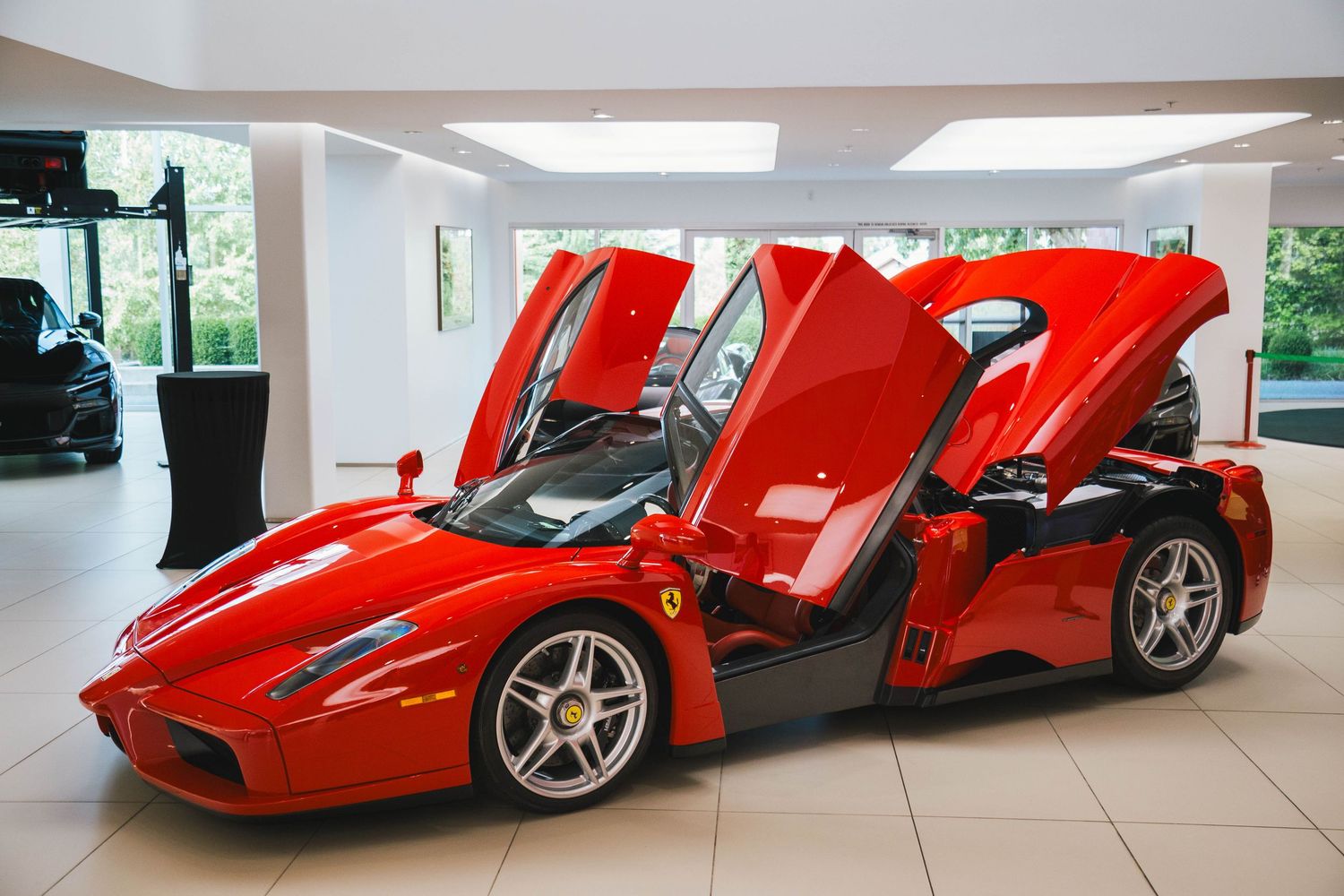 Ferrari Enzo in Red with doors open at Ron Tonkin Ferrari