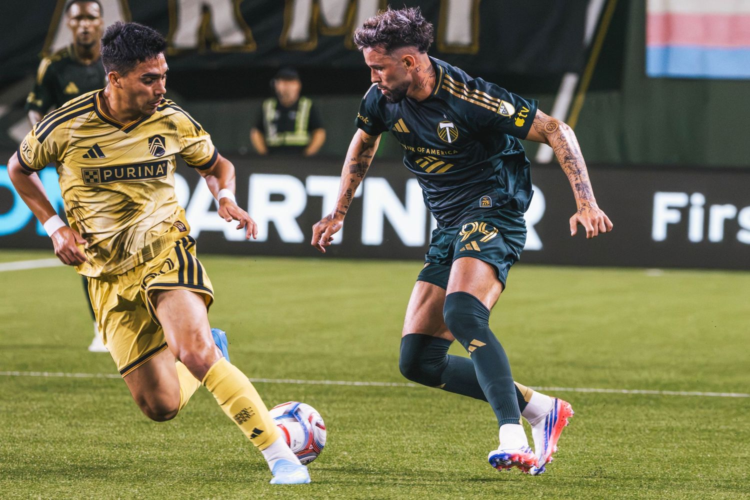 Portland Timbers players competing against St. Louis CITY SC during a Major League Soccer match at Providence Park in Portland, Oregon.