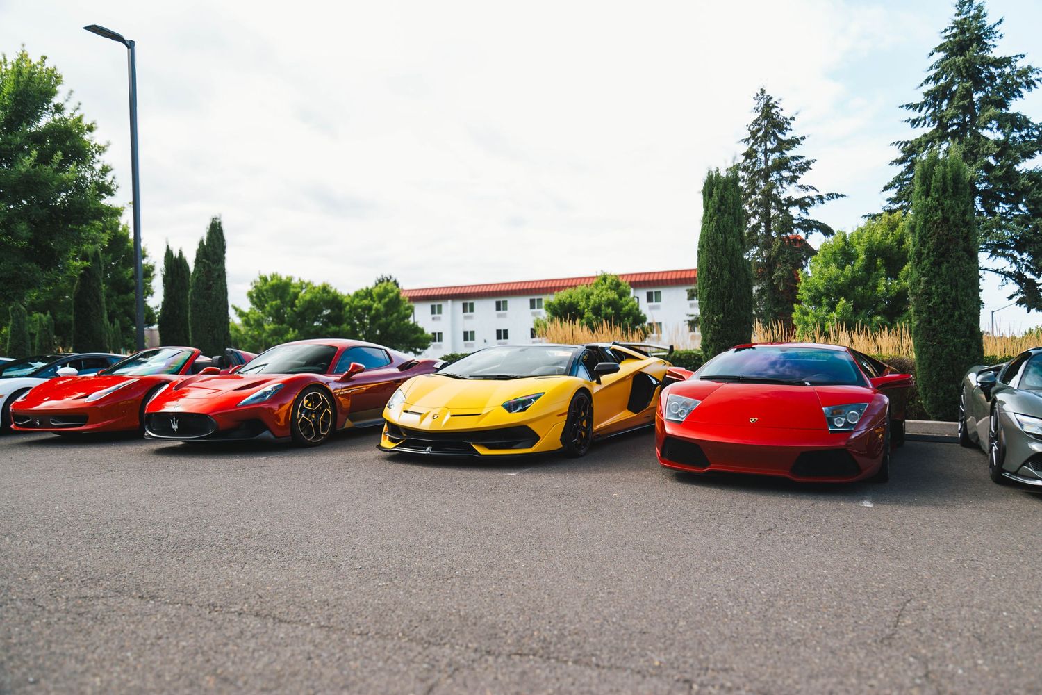 Ferrari 458, Maserati MC20, Lamborghini Aventador SVJ, and Lamborghini Murciélago at Italian Cars and Coffee hosted by Ron Tonkin Ferrari.