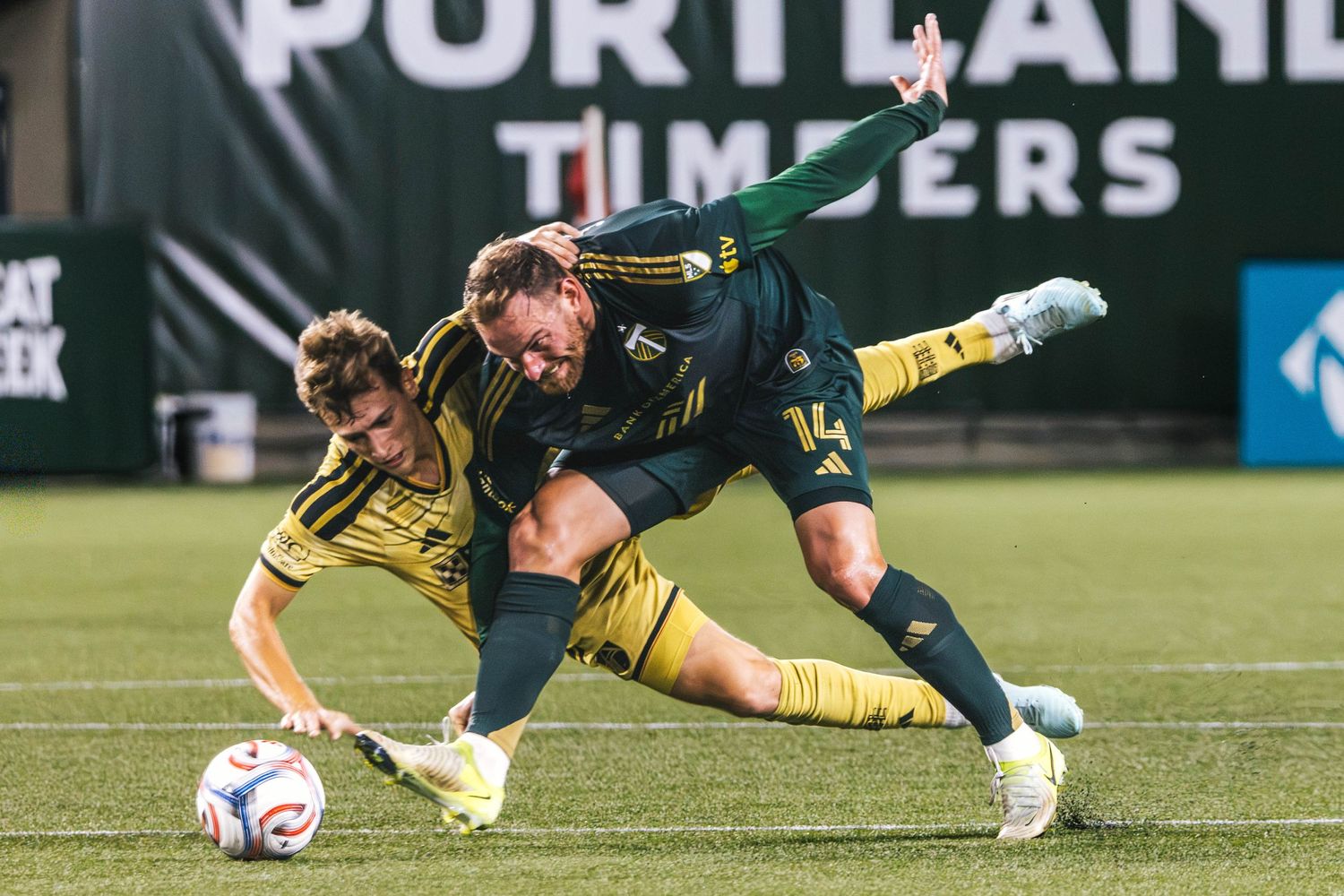 Portland Timbers players competing against St. Louis CITY SC during a Major League Soccer match at Providence Park in Portland, Oregon.