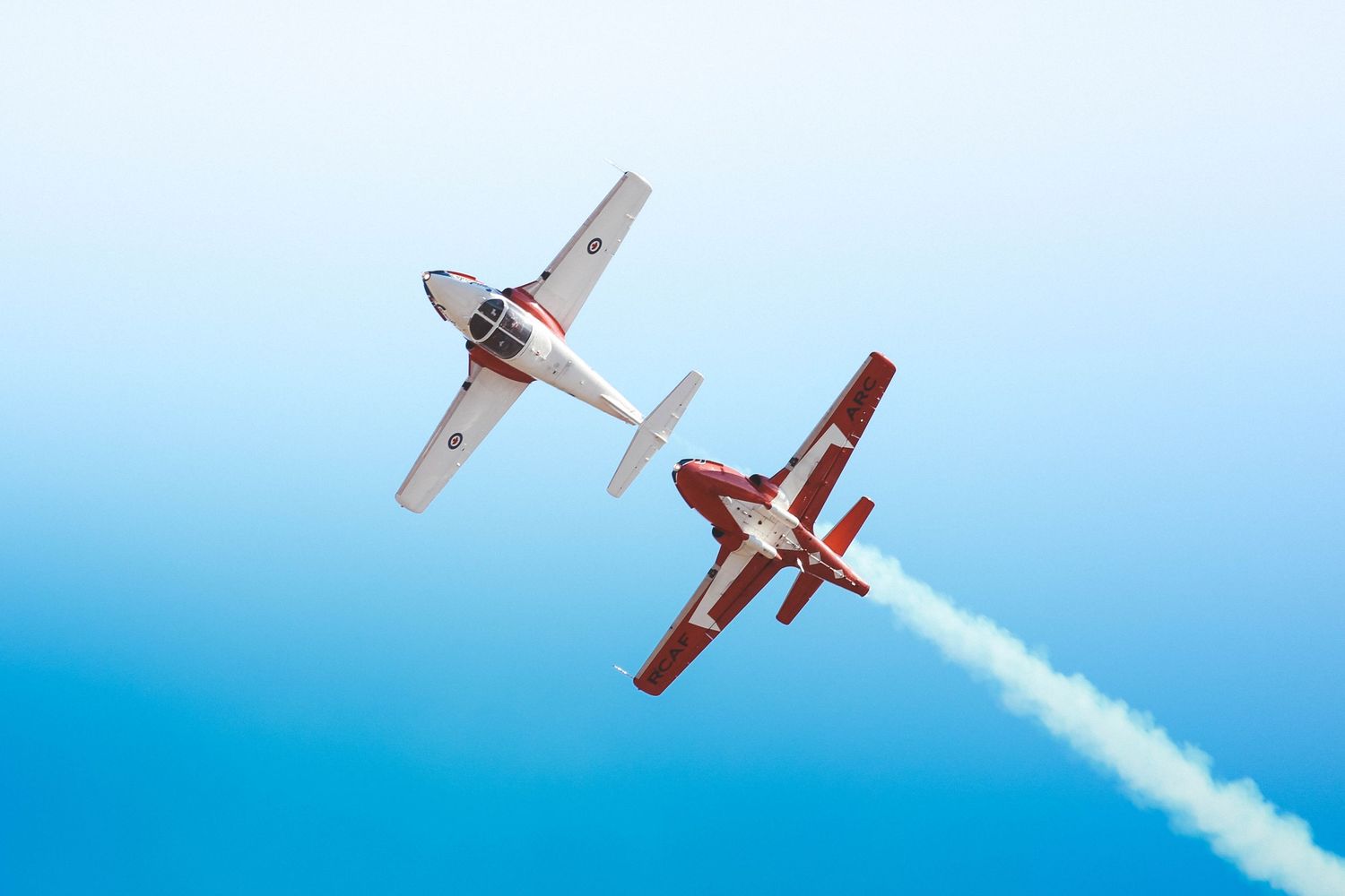 Photos from the 2025 McMinnville Air Show in McMinnville Oregon featuring the SnowBirds flying in formation over the crowd.