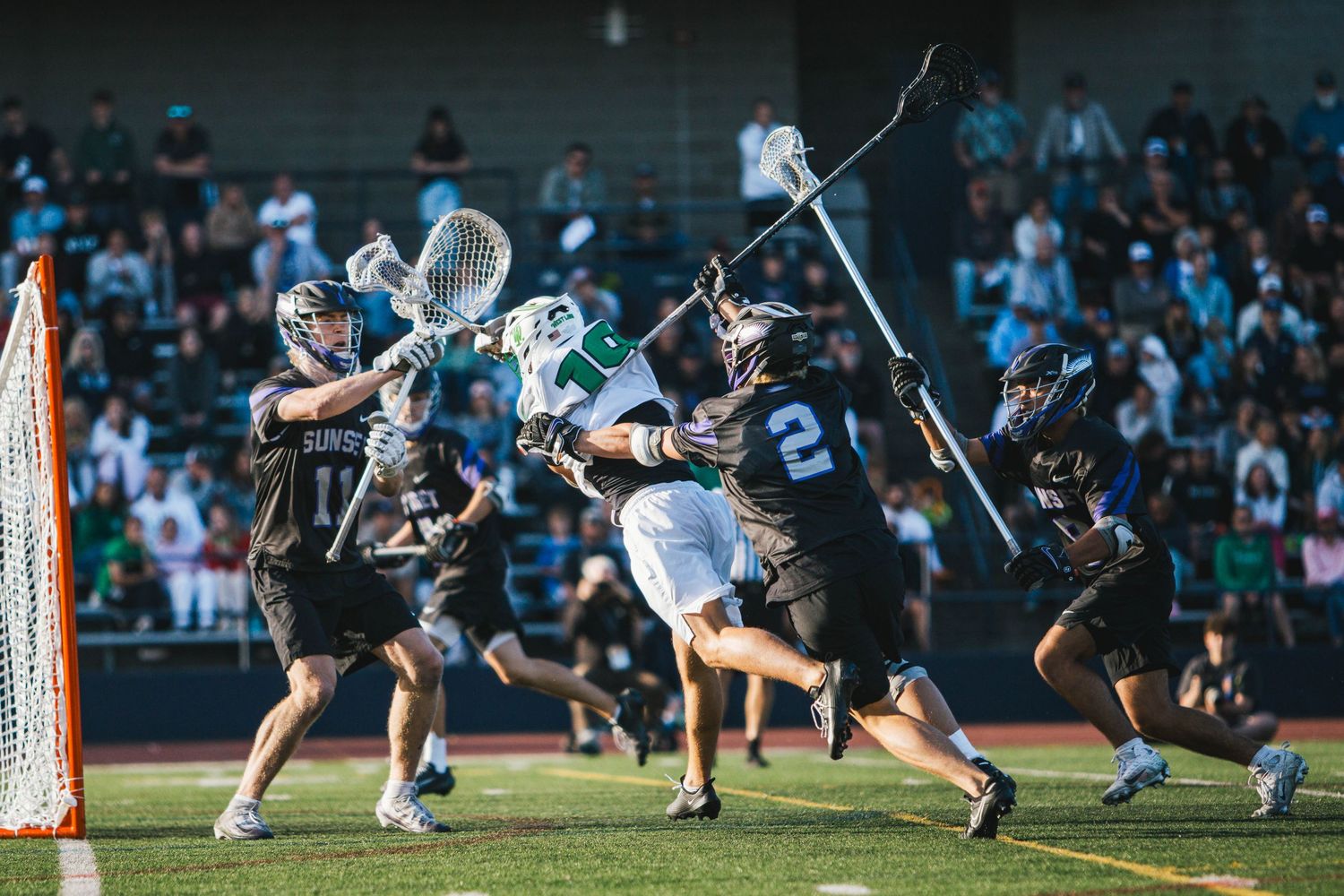 West Linn Lions Varsity Lacrosse fighting for a title at Lake Oswego High School in Oregon.