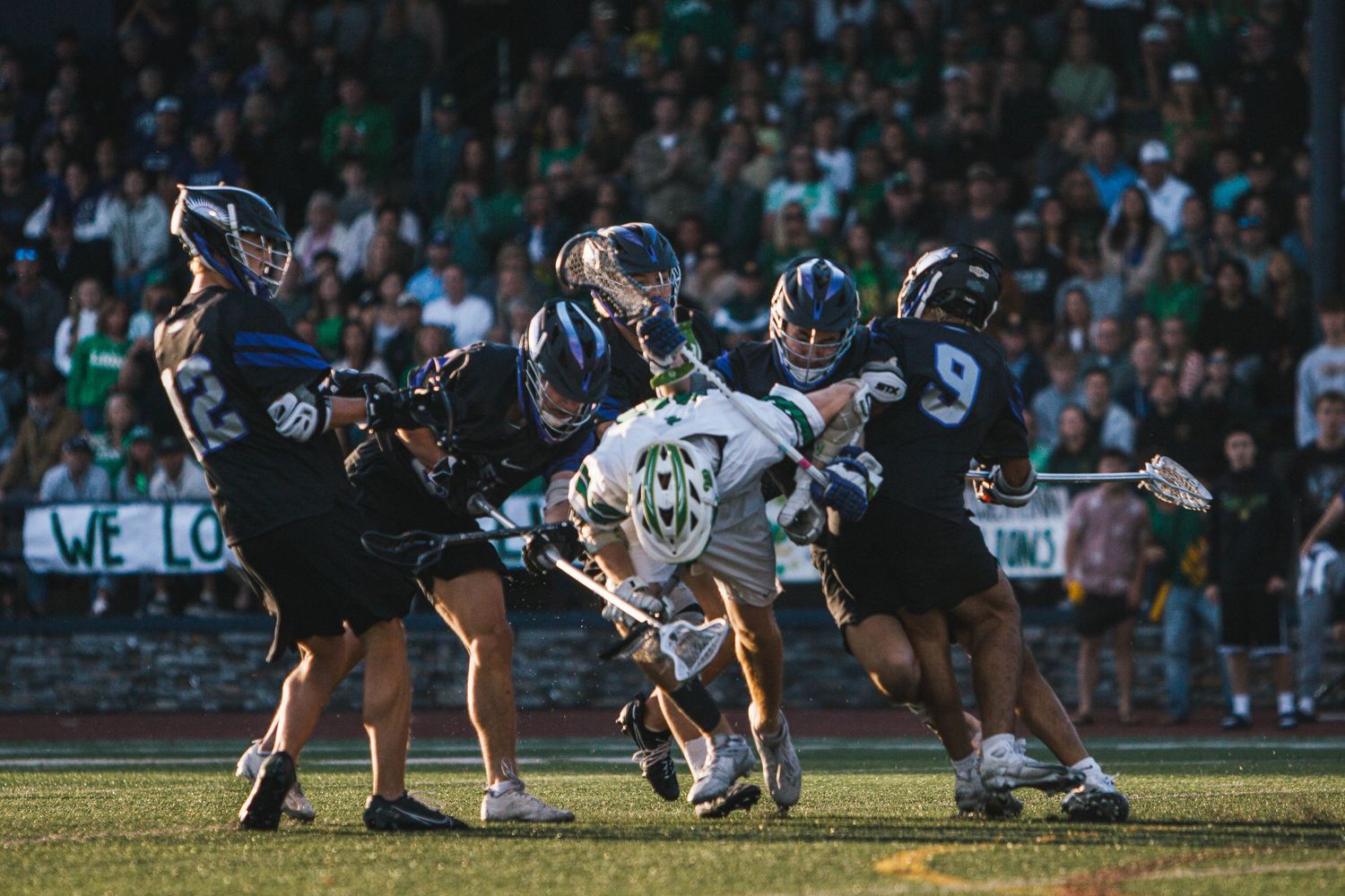 West Linn Lions Varsity Lacrosse fighting for a title at Lake Oswego High School in Oregon.