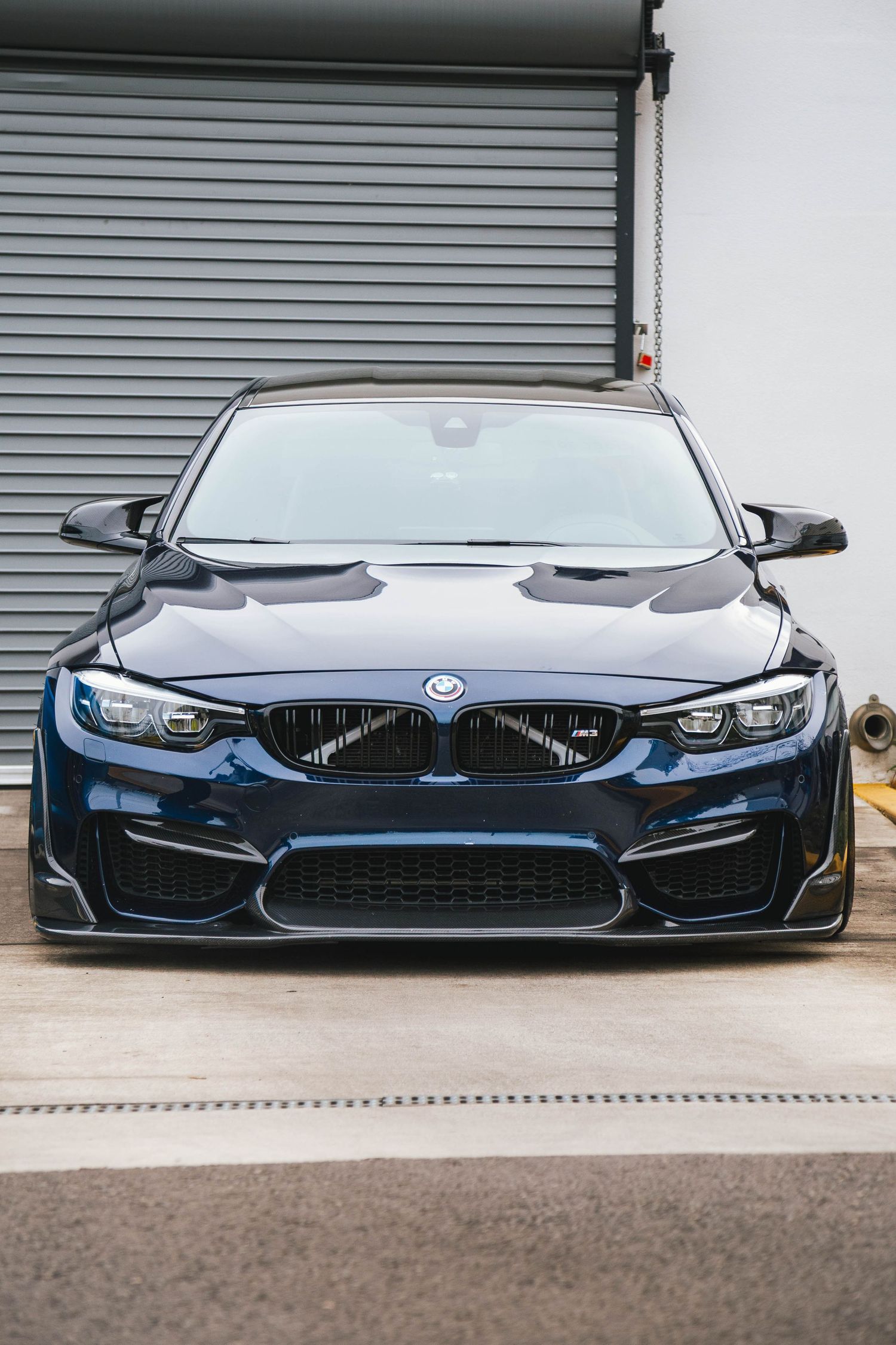 Blue BMW M3 parked at BMW Cars and Coffee.