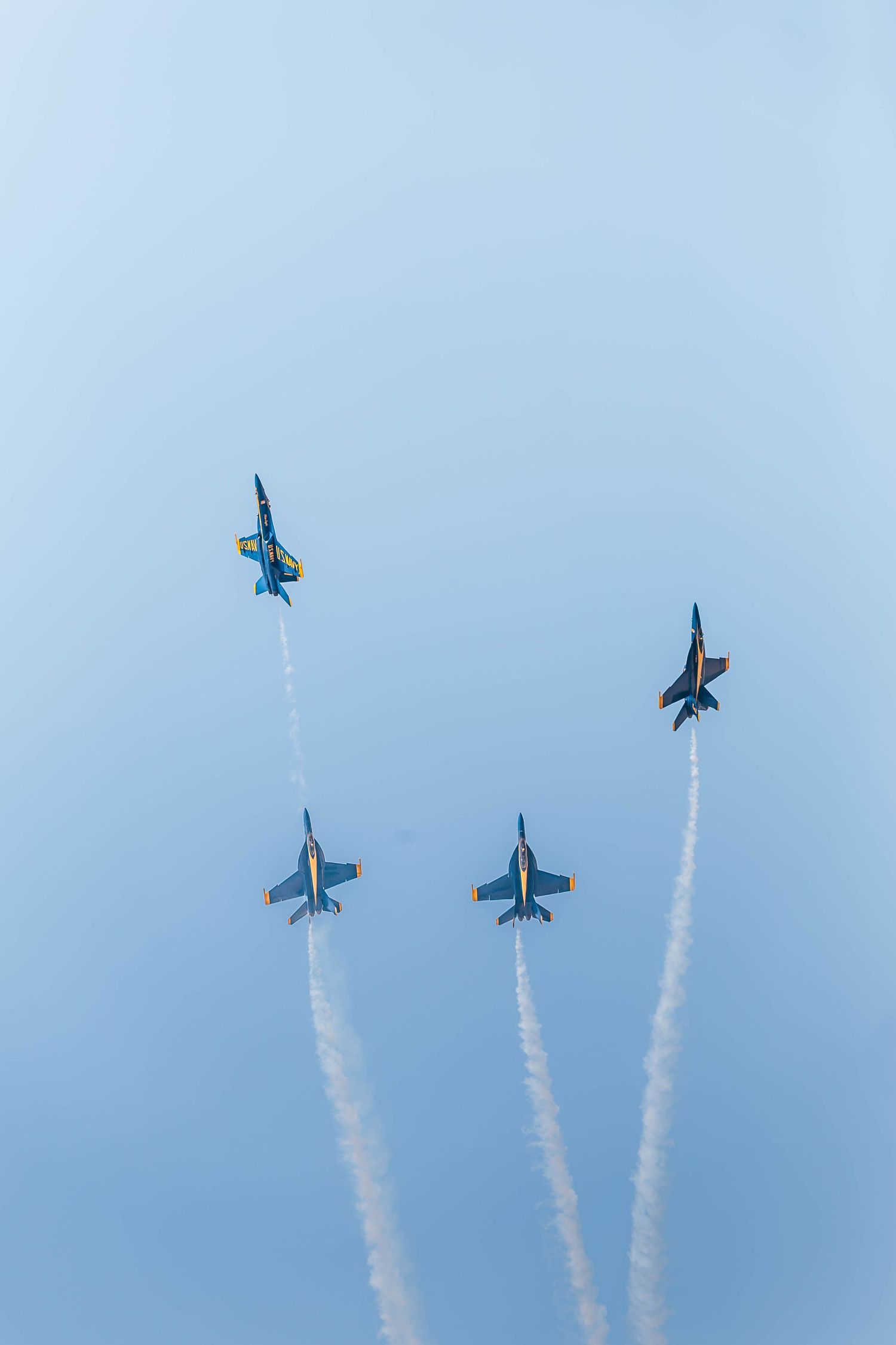 U.S. Navy Blue Angels F/A-18 Super Hornets performing aerial maneuvers at the Oregon International Air Show in McMinnville, Oregon.