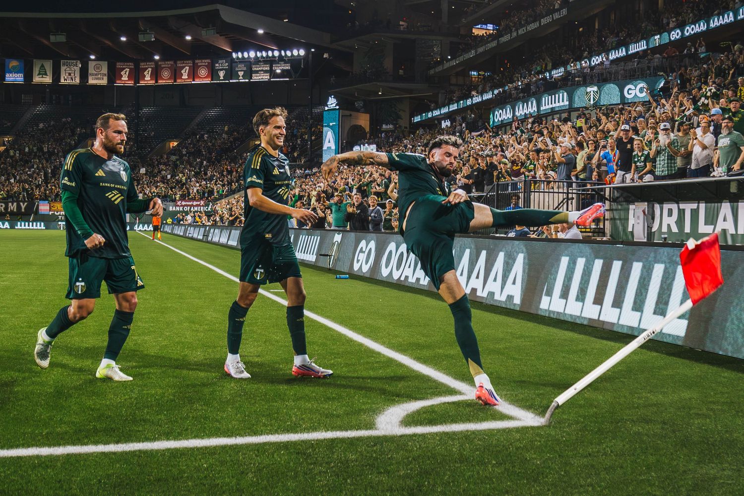 Portland Timbers players competing against St. Louis CITY SC during a Major League Soccer match at Providence Park in Portland, Oregon.