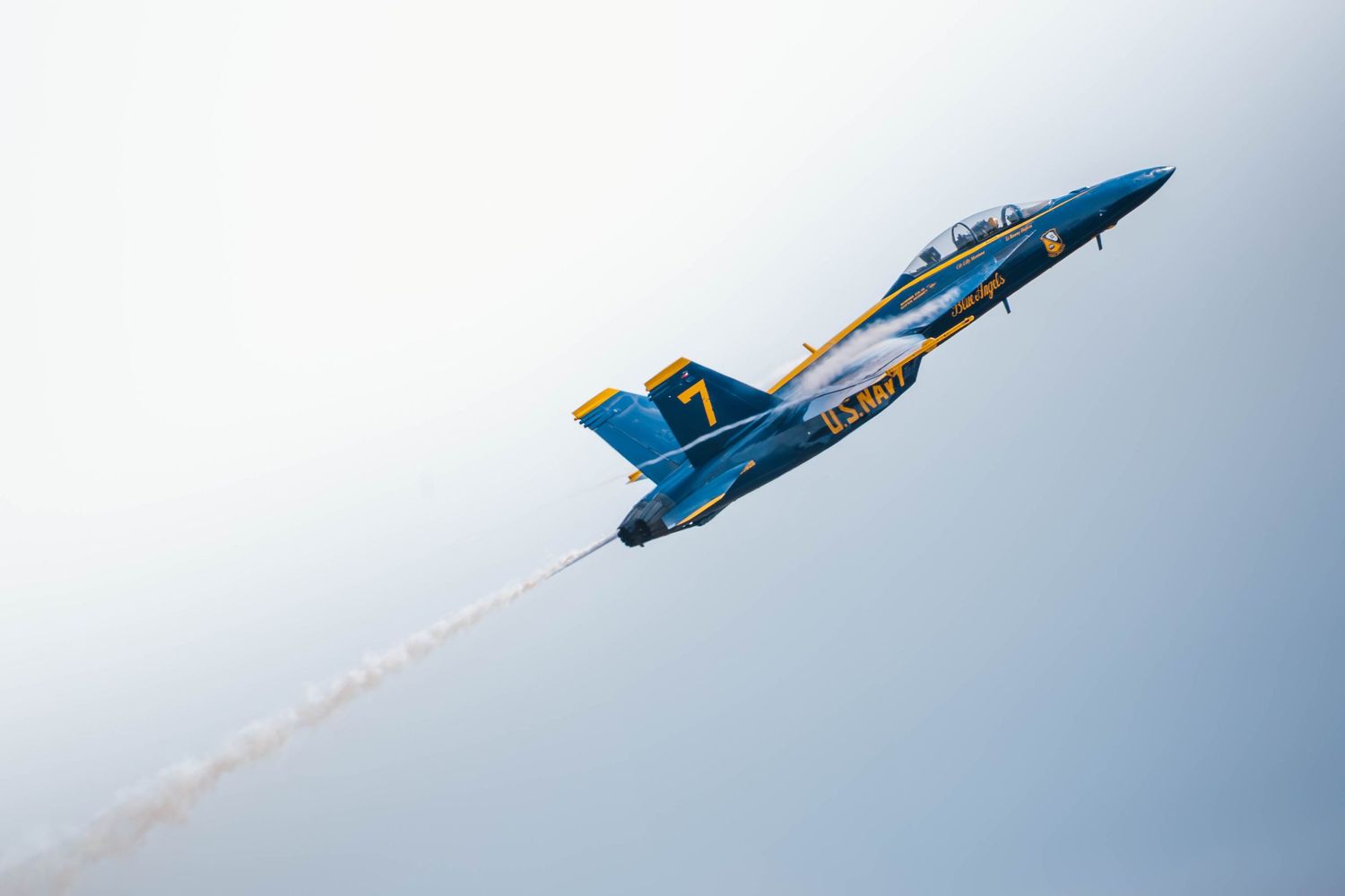U.S. Navy Blue Angels F/A-18 Super Hornets performing aerial maneuvers at the Oregon International Air Show in McMinnville, Oregon.