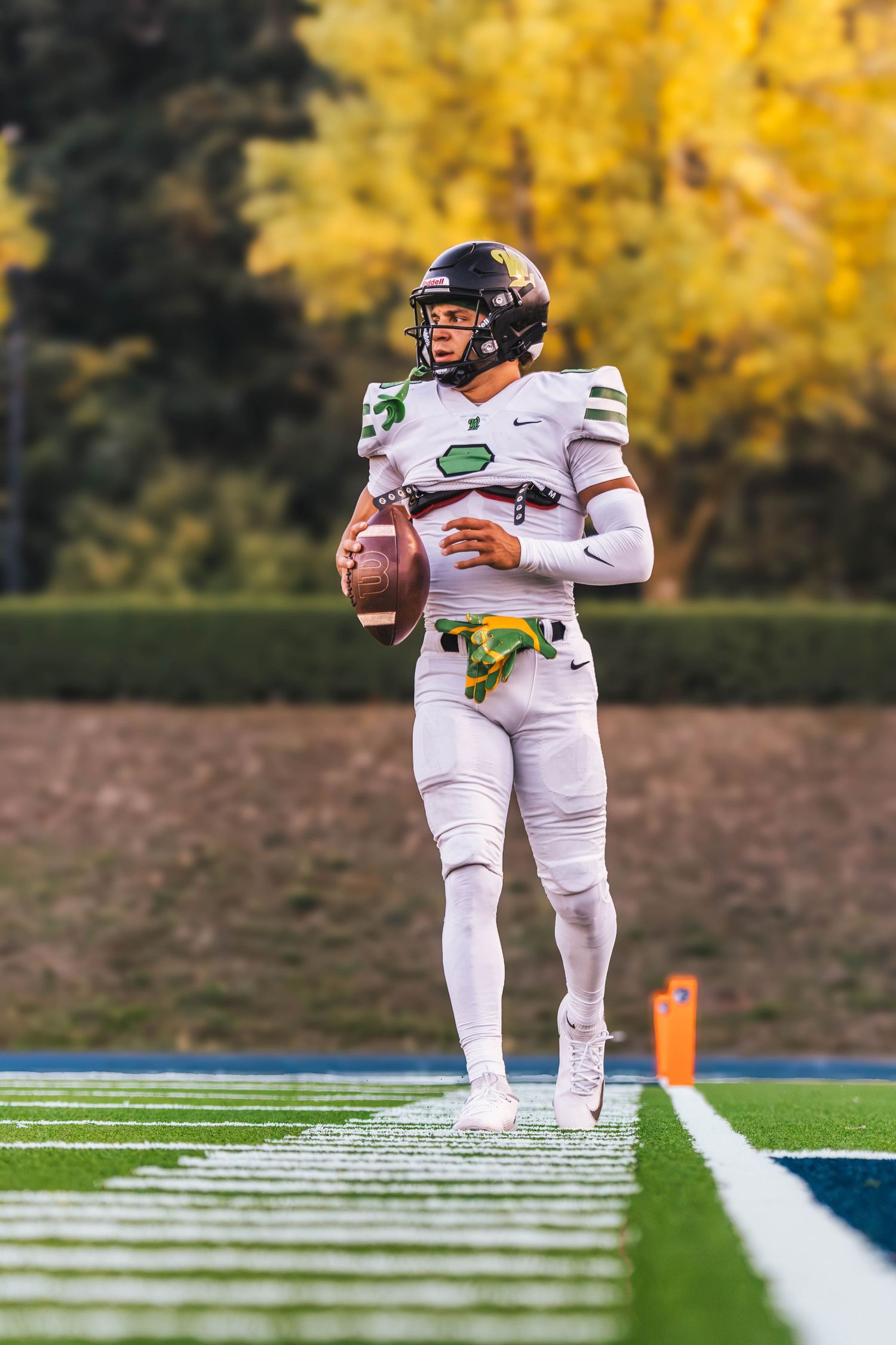 West Linn Lions football players competing during a high school football game in West Linn, Oregon.
