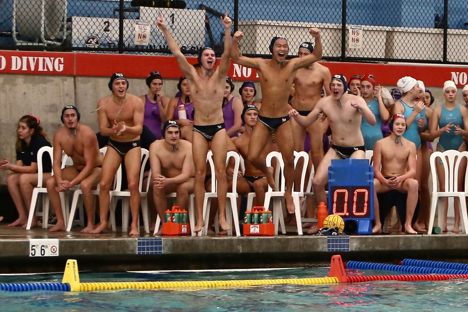 Water Polo state champions, Lake Oswego, celebrate as they win the title.