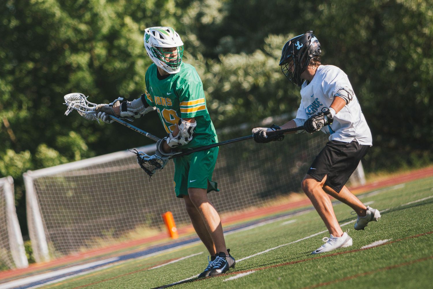 West Linn Lions Varsity Lacrosse fighting for a title at Lake Oswego High School in Oregon.