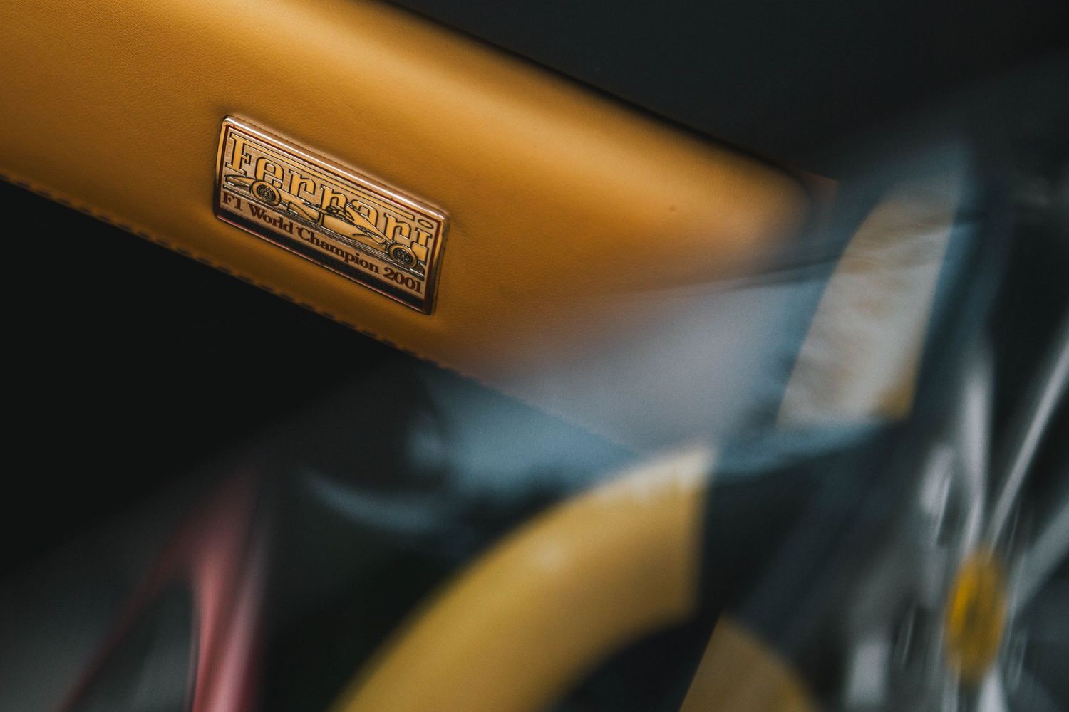Ferrari champion badge dashboard.