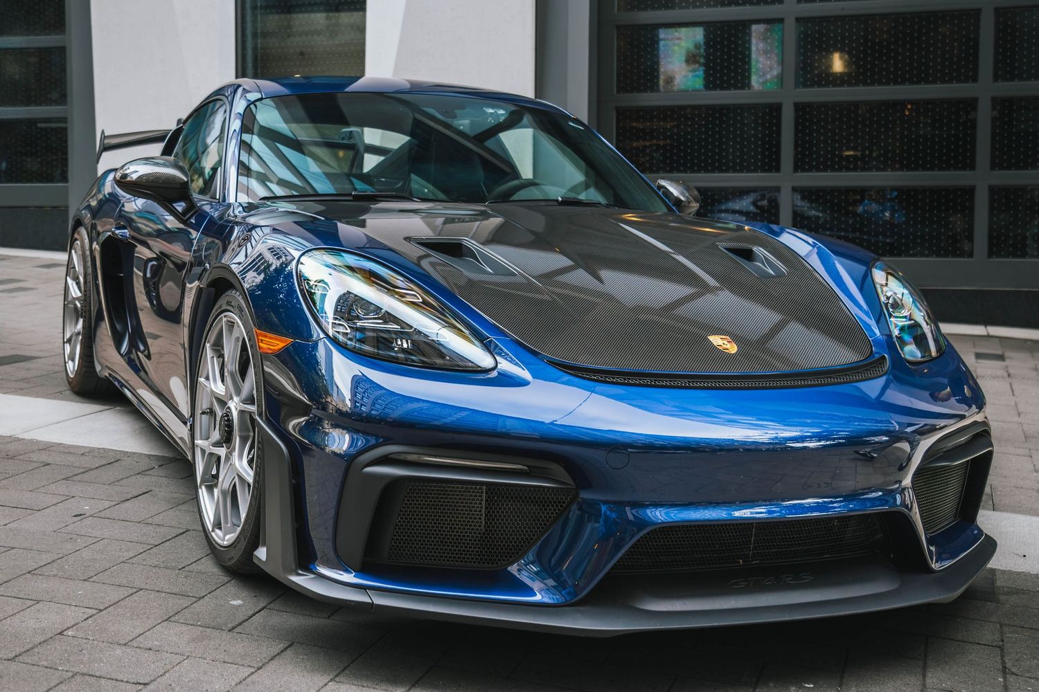 Porsche 718 GT4 RS in Blue in a urban environment downtown Portland Oregon.