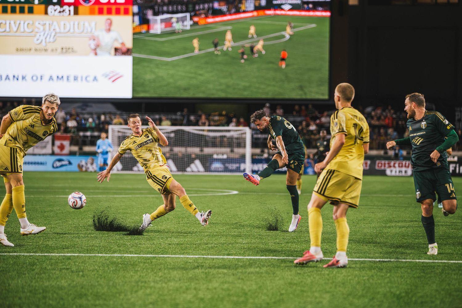 Portland Timbers players competing against St. Louis CITY SC during a Major League Soccer match at Providence Park in Portland, Oregon.