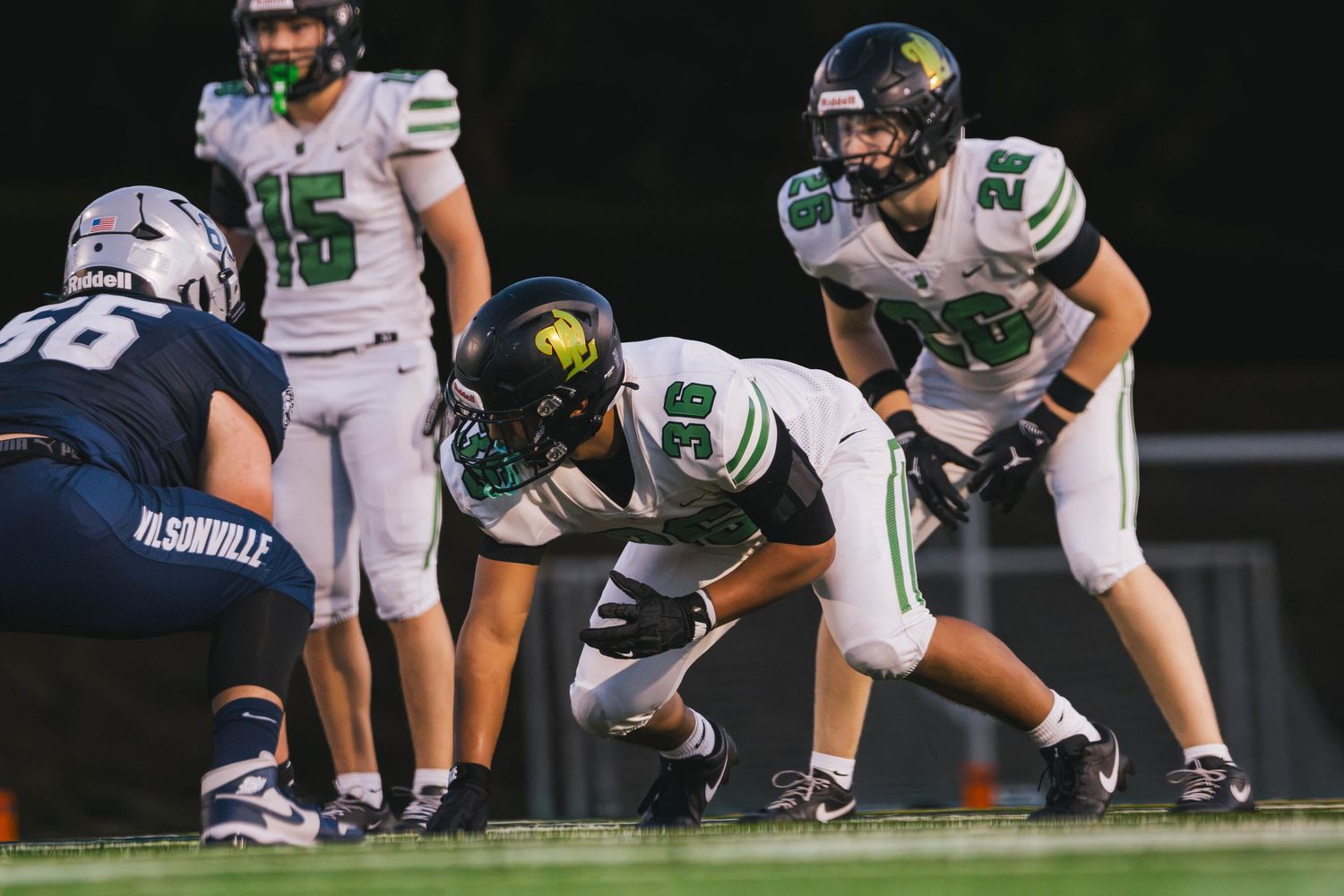 West Linn Lions football players competing during a high school football game in West Linn, Oregon.