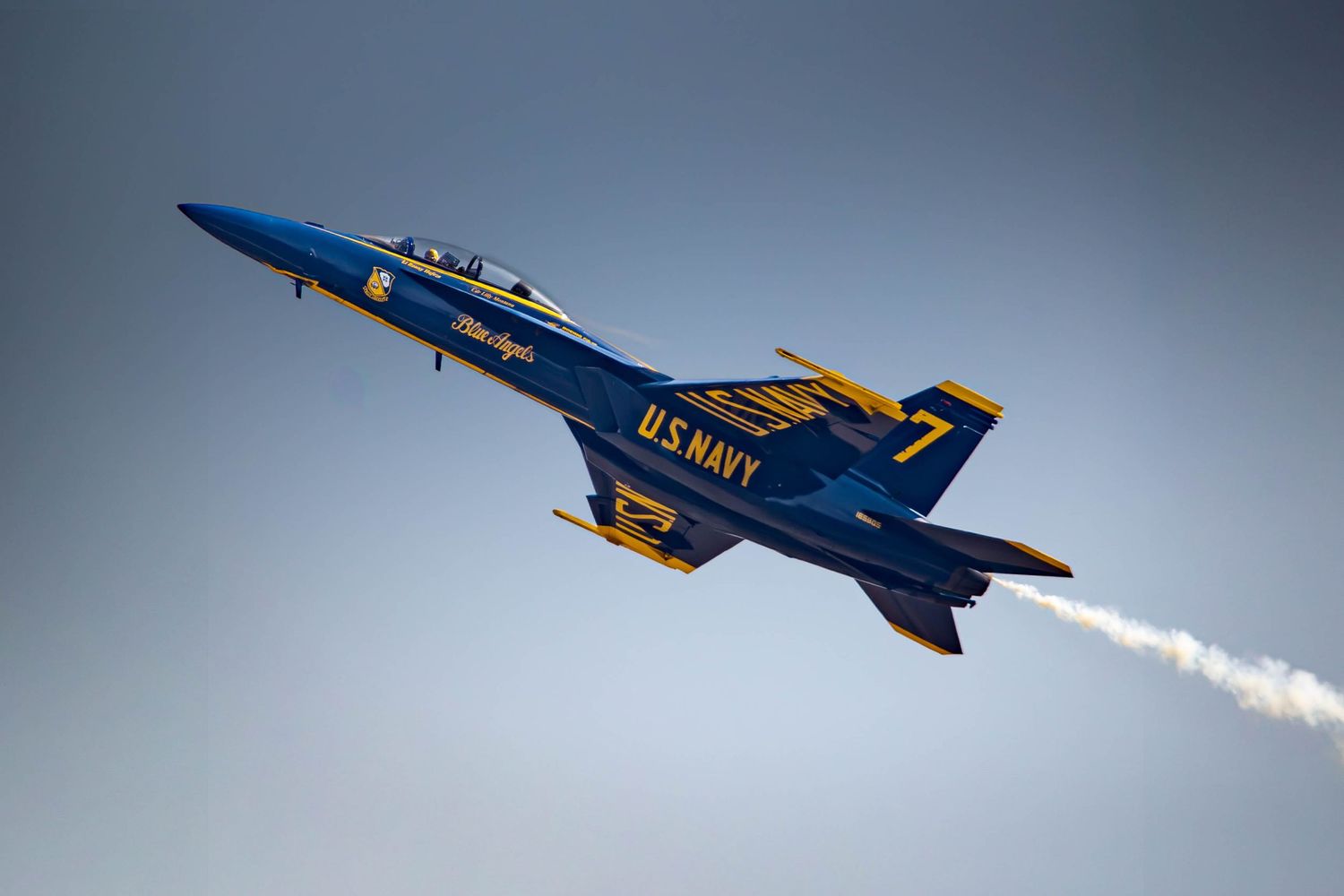 Blue Angels jet number 7 performing a steep climb at the 2026 McMinnville Air Show in McMinnville Oregon.