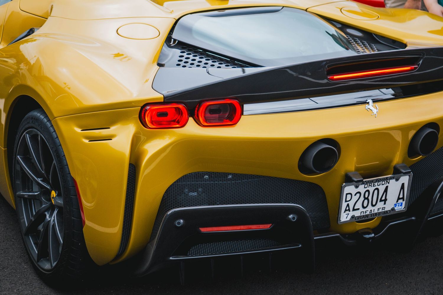 Ferrari SF90 in gold rear photo