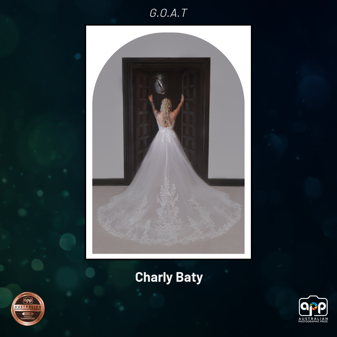 Charly Baty G.O.A.T award-winning bridal gown with lace train, backless design, photographed by APP Australian.