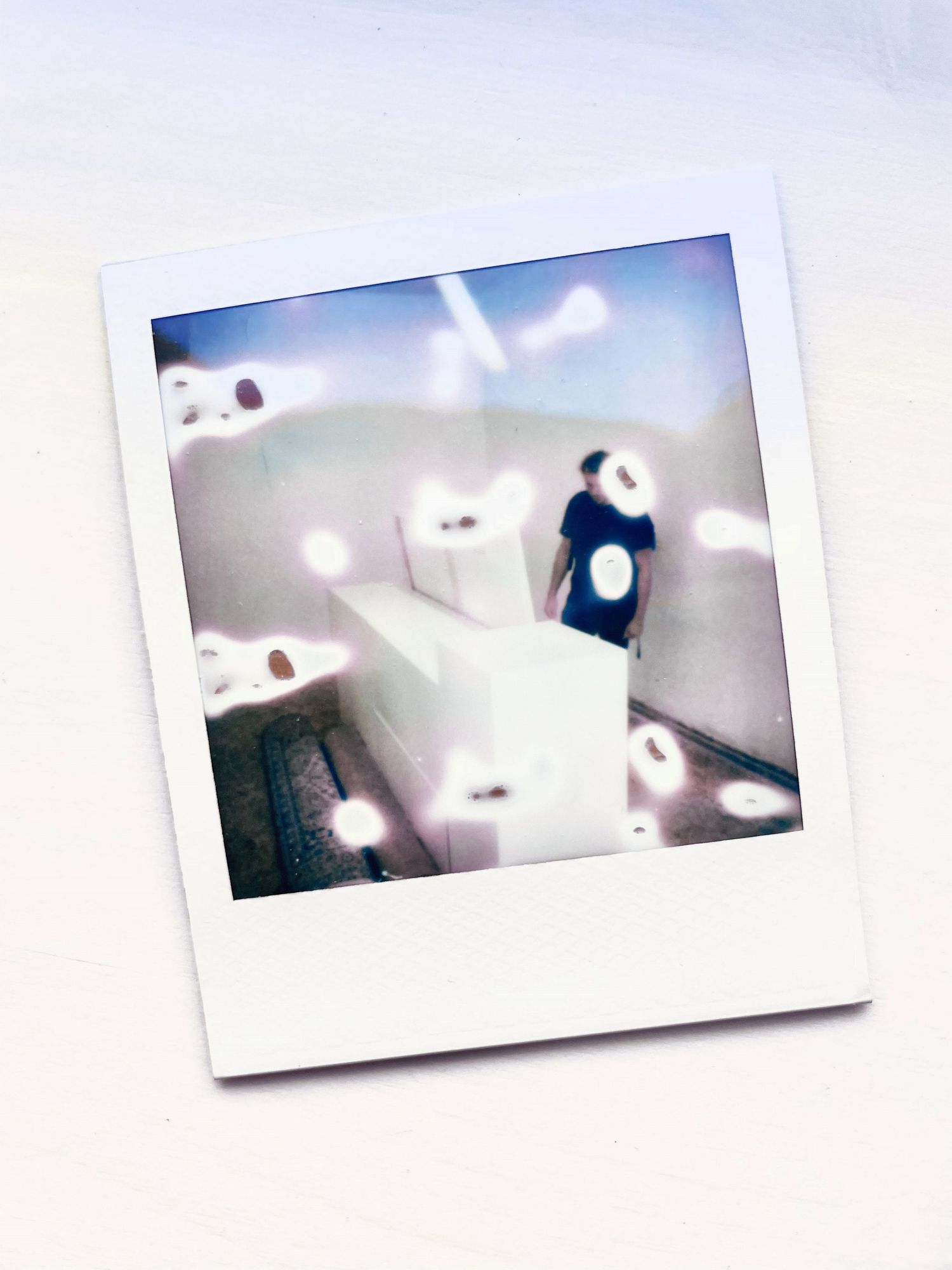 Instax picture of white blocks at the studio