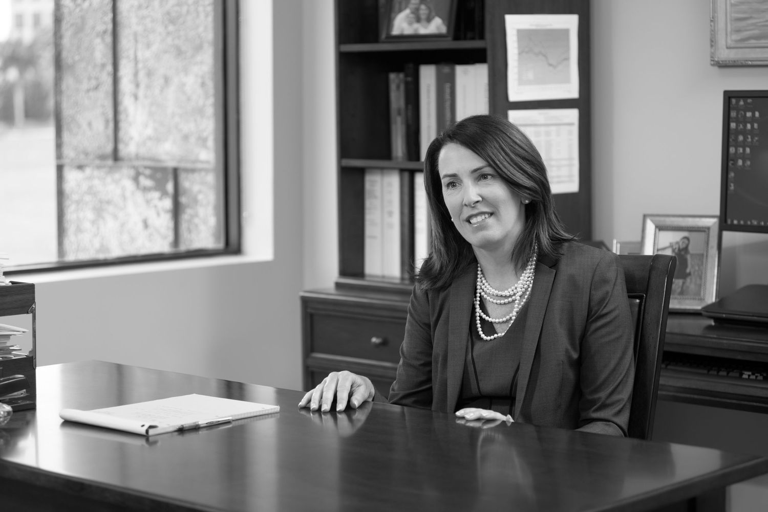 Business headshot photographer Tampa Bay — HR director portrait in corporate office