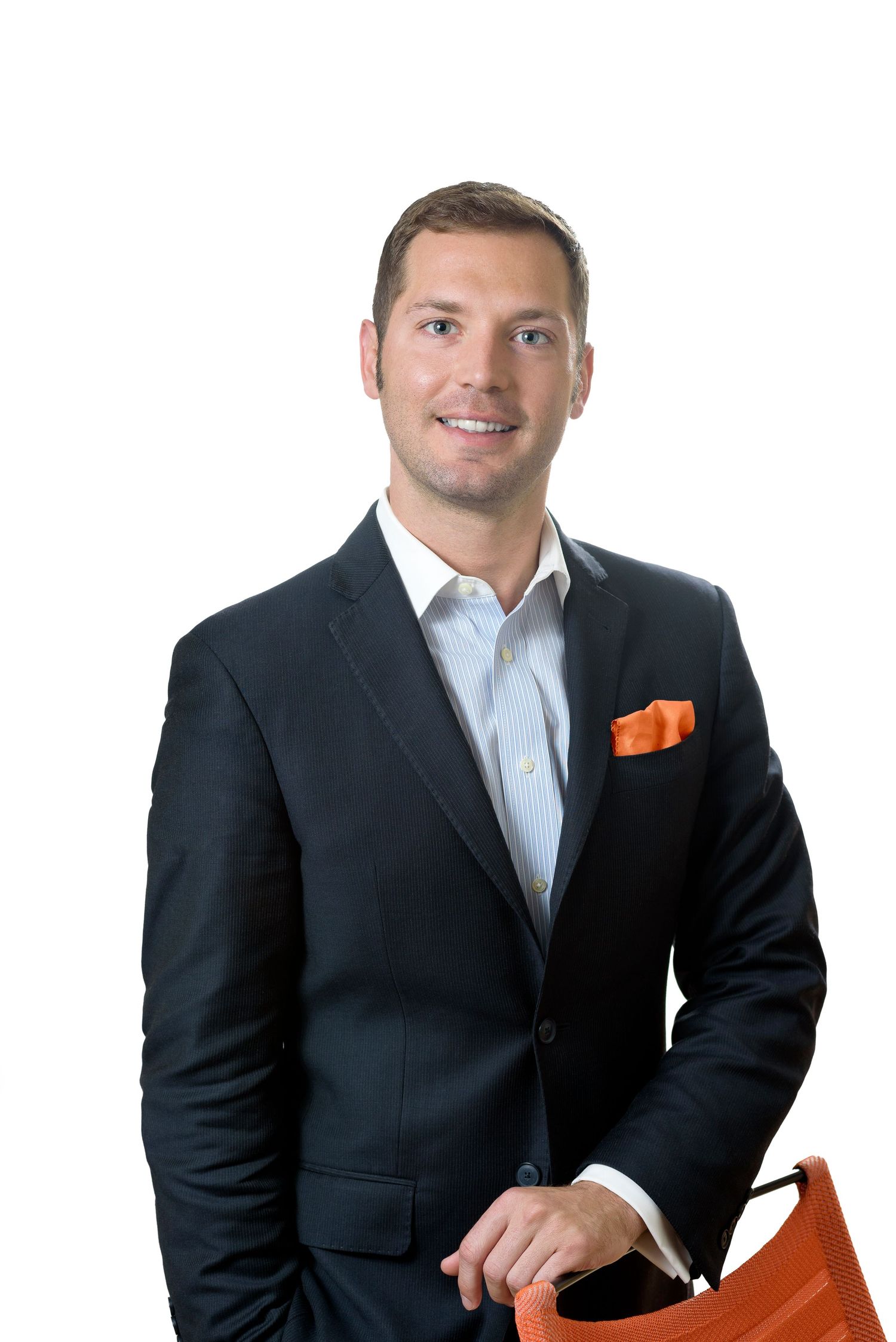 Real estate headshot photography St. Petersburg FL — studio portrait of a local realtor