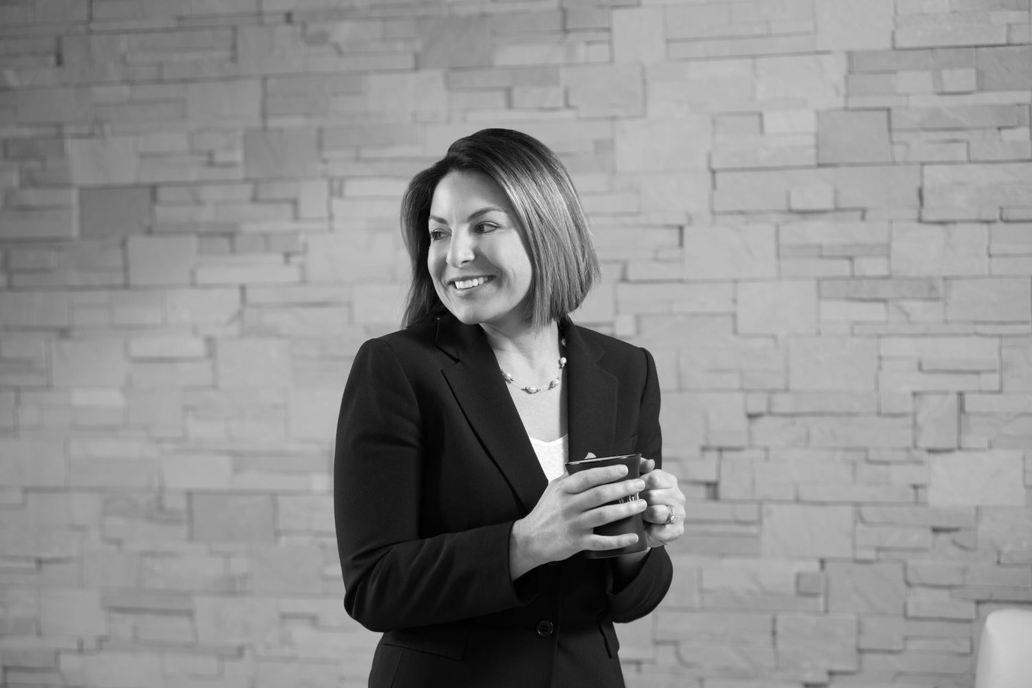 On-location portrait photographer Sarasota — marketing executive photographed in office