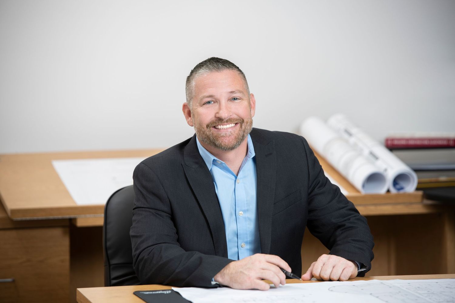 Corporate portrait photographer Sarasota — architect headshot in office
