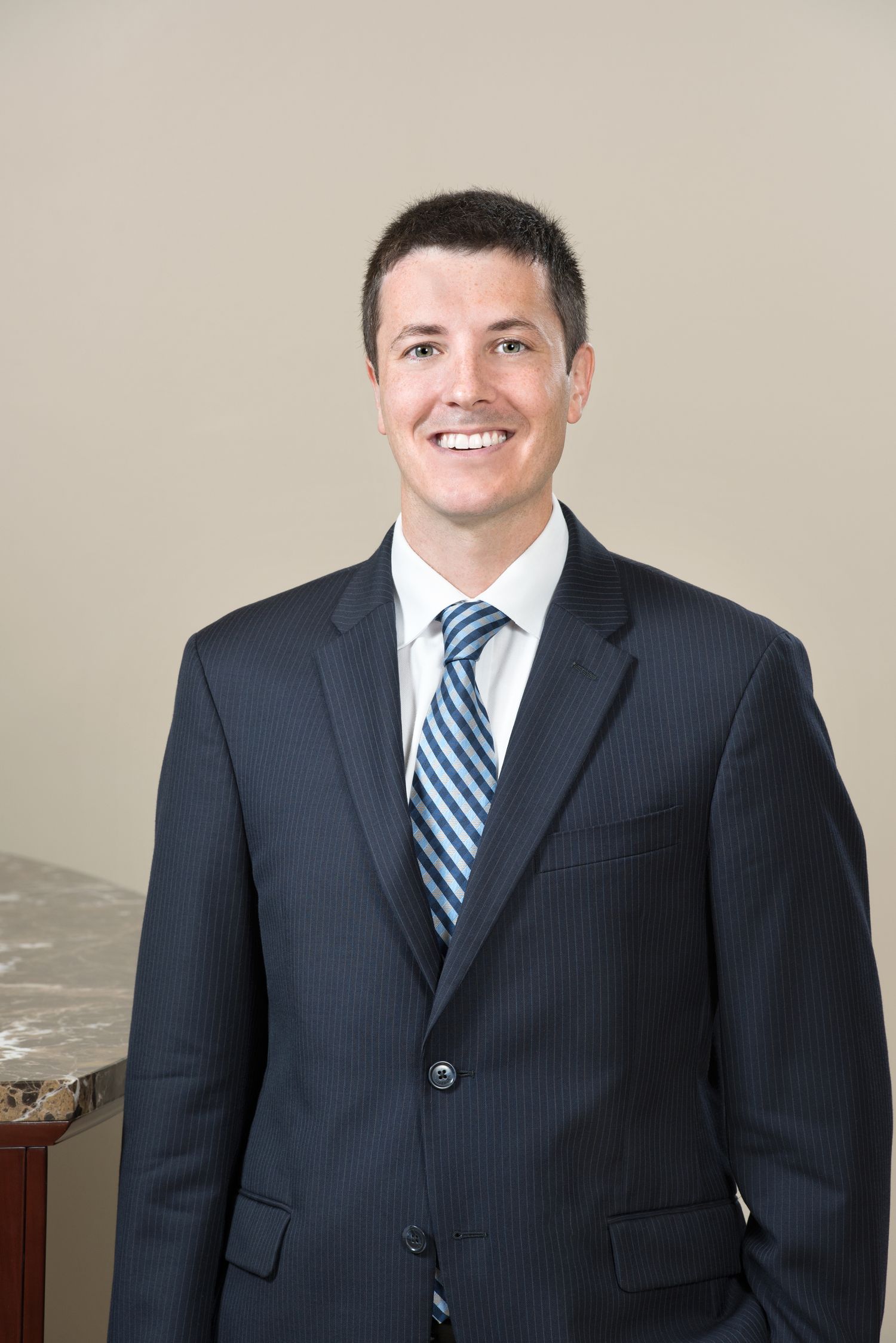Corporate headshot Tampa Bay — executive portrait shot in office lobby