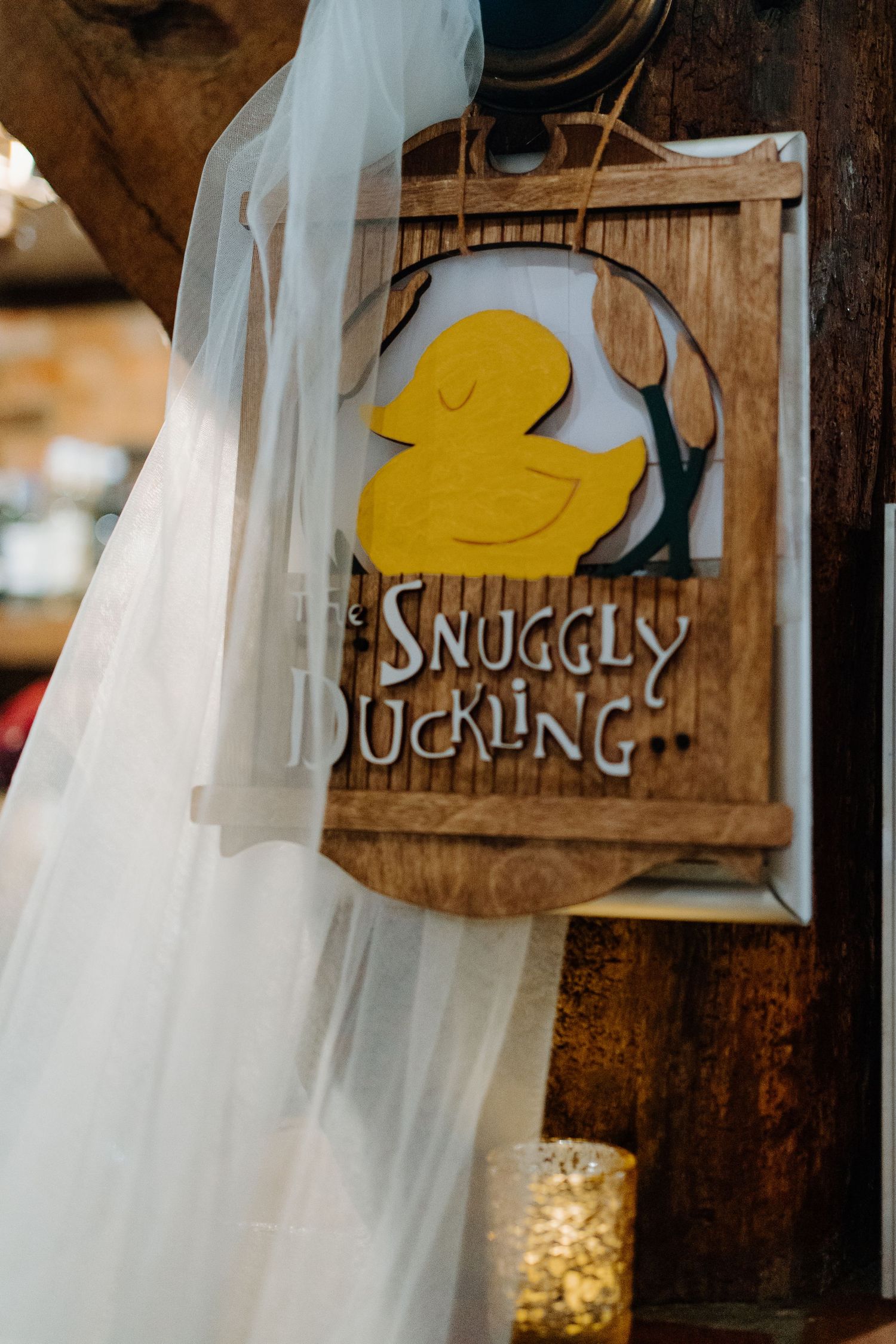 Wooden business sign displaying 