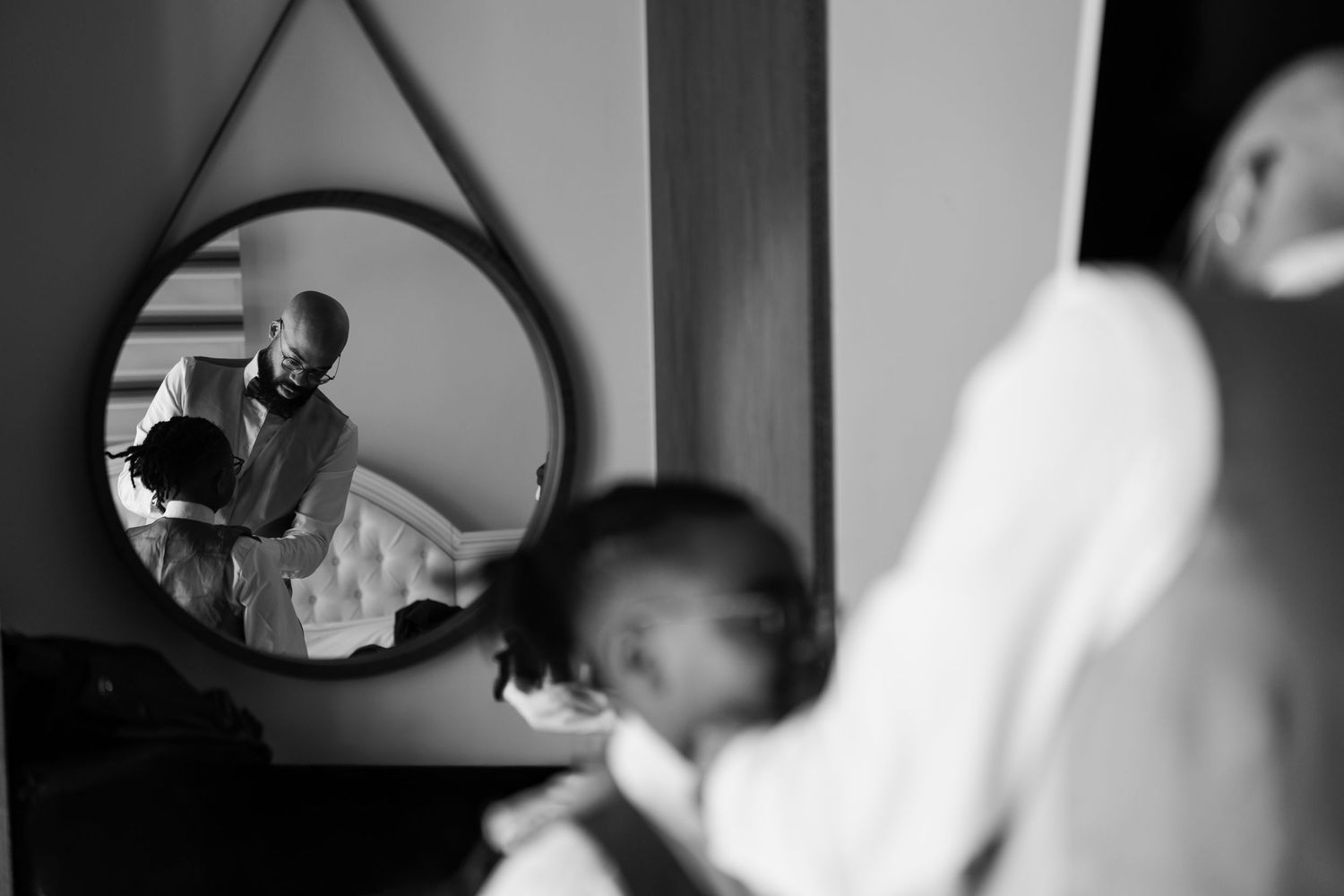 Close-up details of wedding day preparations in monochrome.