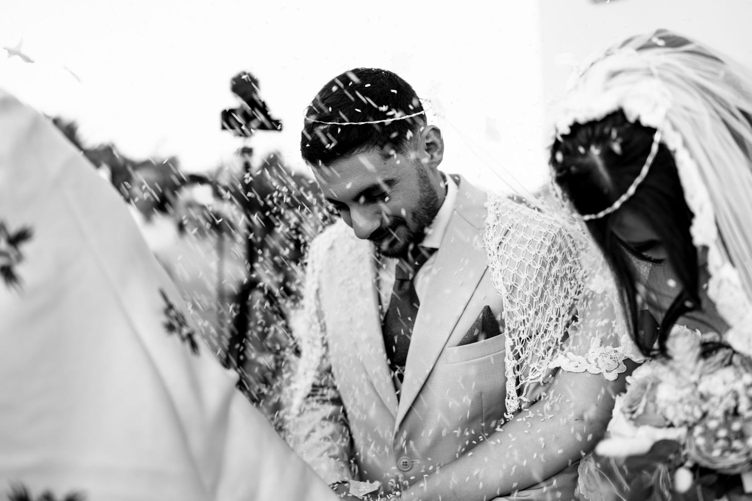 Series of joyful wedding moments in black and white photography.