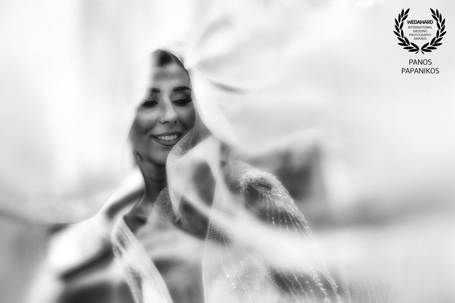 Soft focus black and white wedding portraits with ethereal lighting effects.