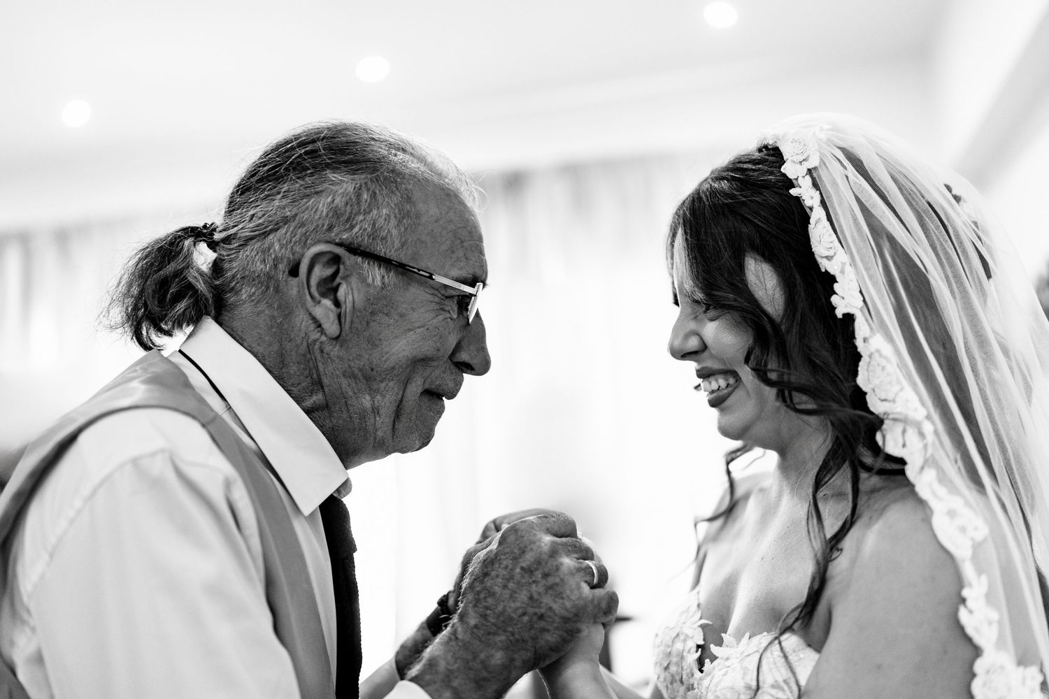 Black and white candid shots capturing intimate wedding moments during the ceremony.