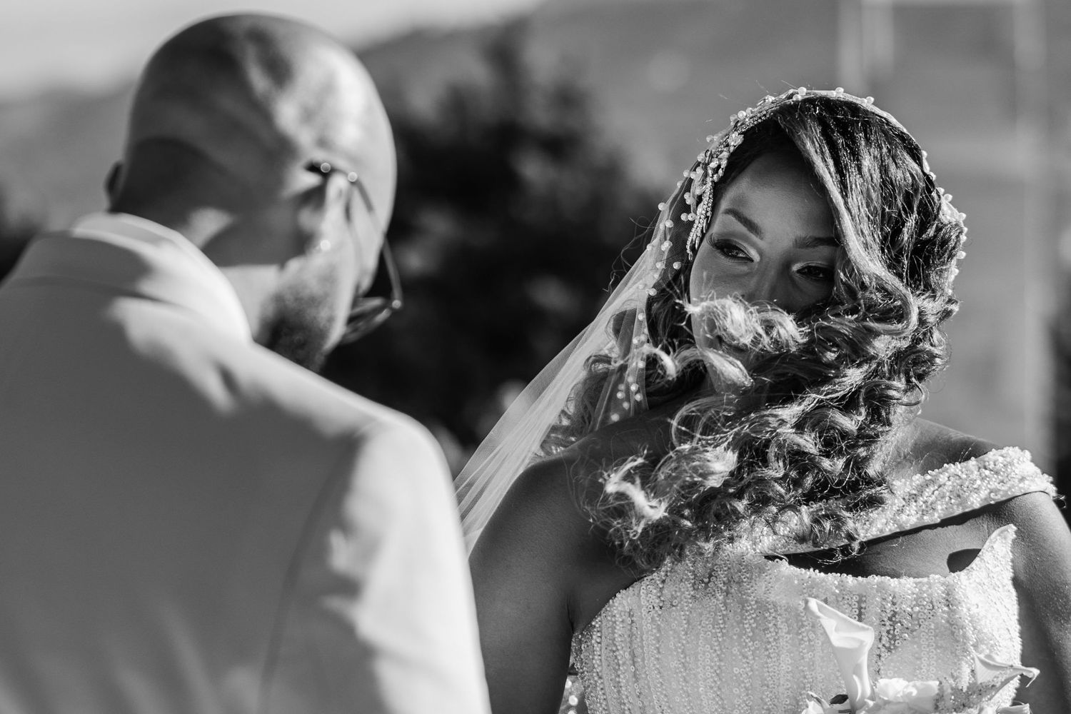 Black and white wedding photos showing elegant parasols casting dramatic shadows.