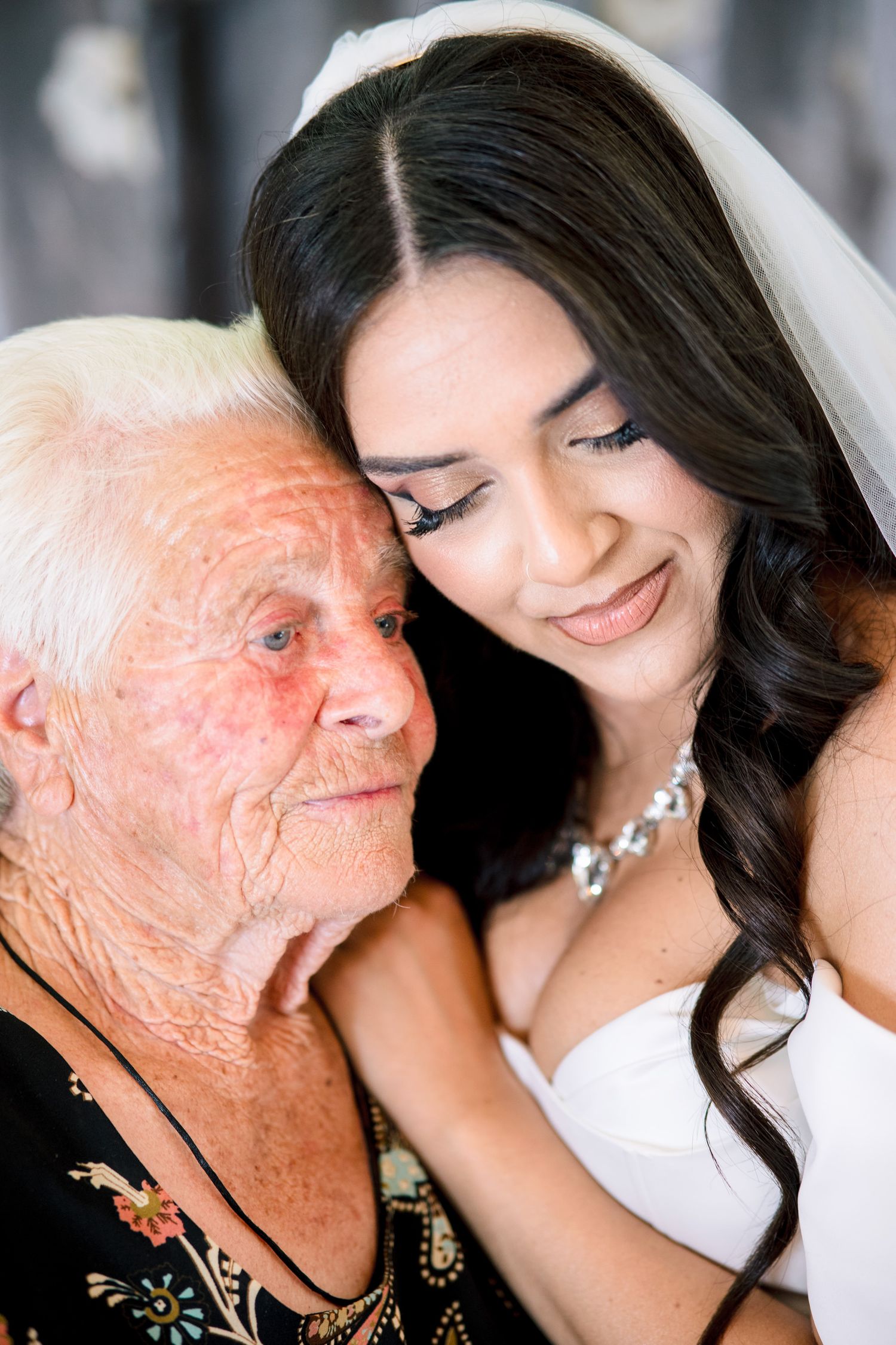 Tender moment shared between two generations on a special occasion.