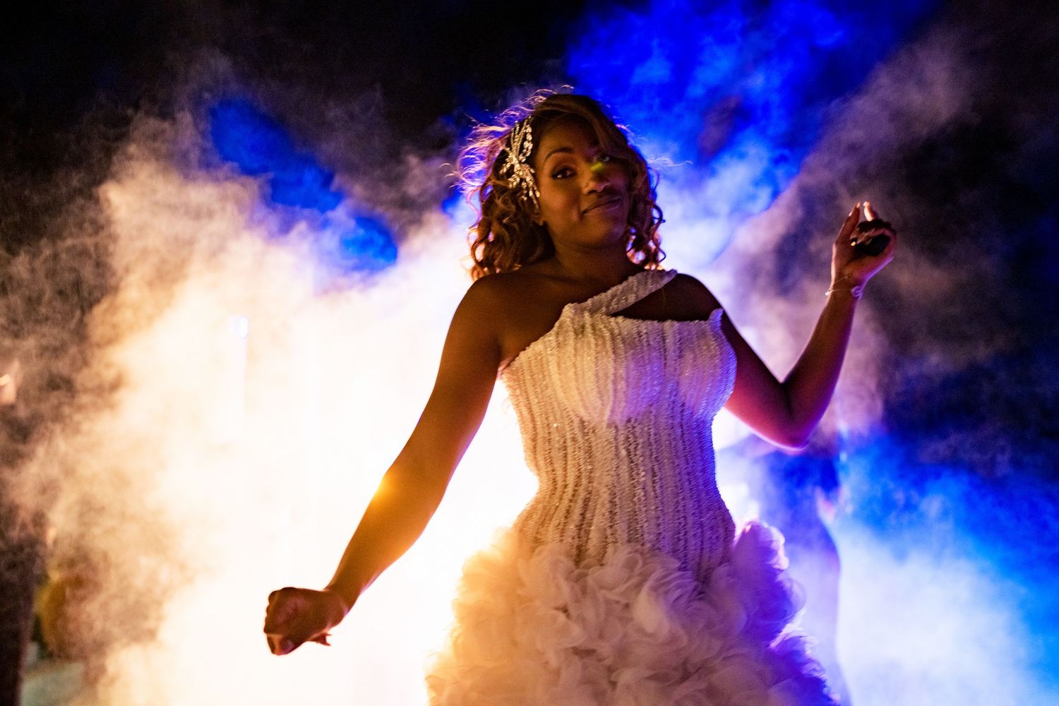 A dramatic wedding dance scene with fog and blue lighting effects creates an ethereal atmosphere.
