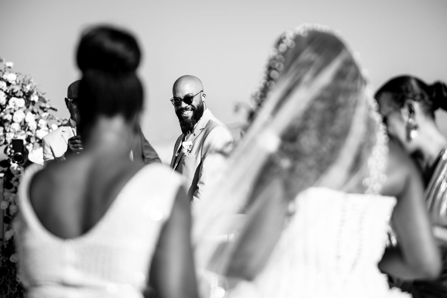 Black and white artistic shots capturing intimate wedding day preparation moments.