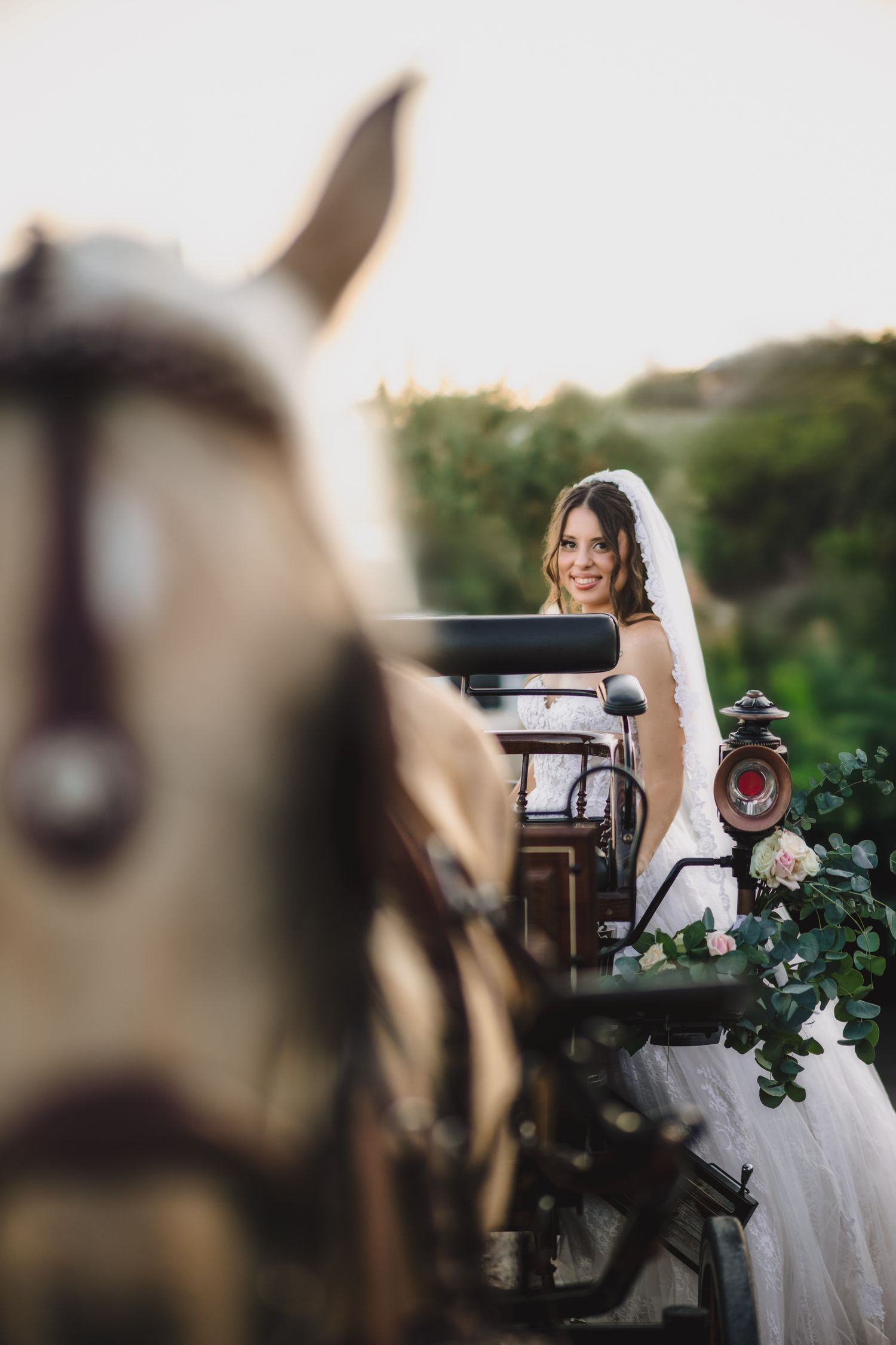 Artistic wedding portrait composition with vintage piano and greenery outdoors.