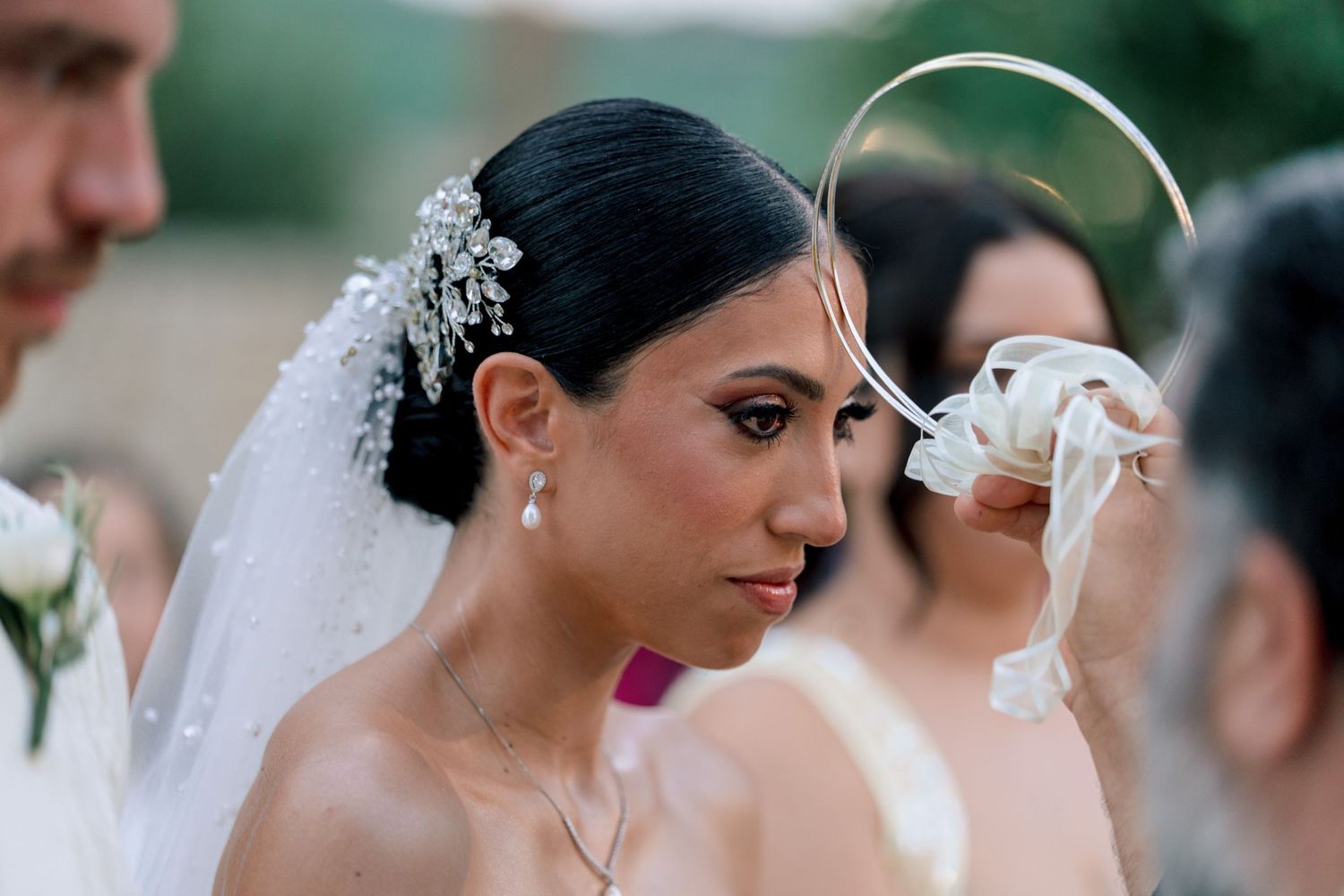 Intimate black and white wedding ceremony photo capturing emotional moments.