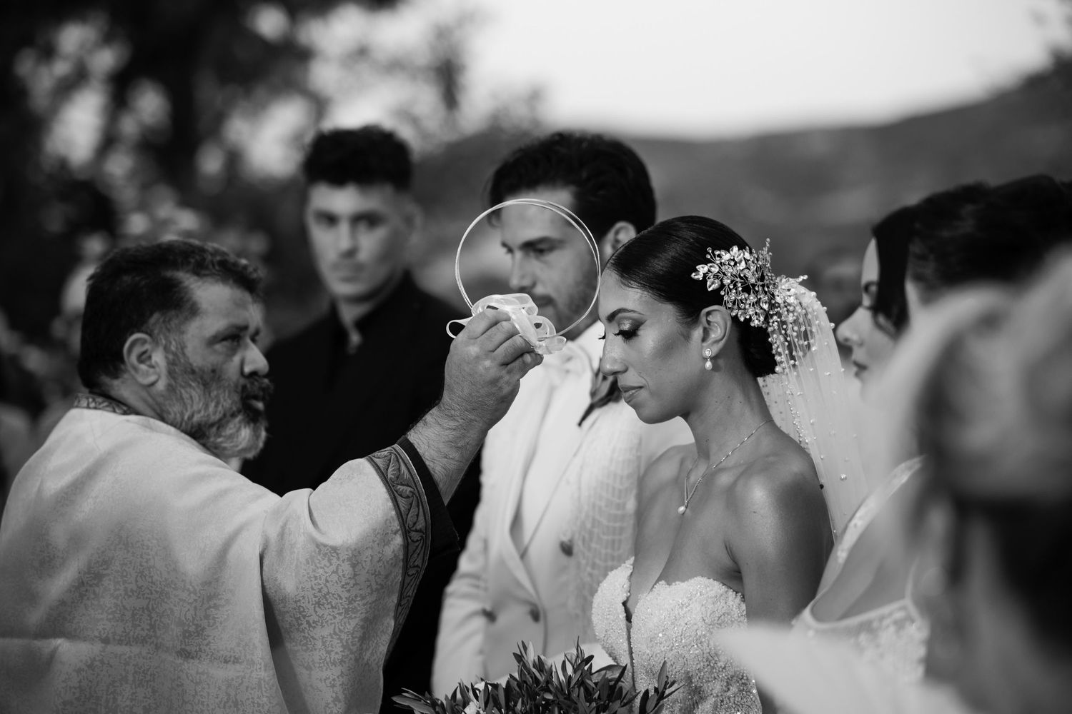 Artistic black and white wedding photography capturing ceremony moments.