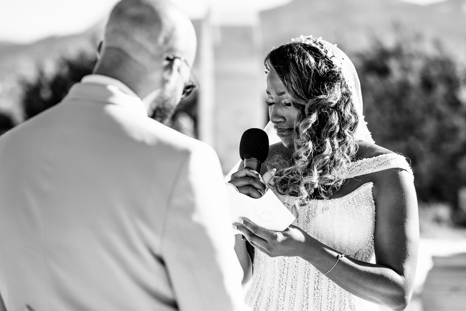 Black and white candid wedding moments captured during the celebration.