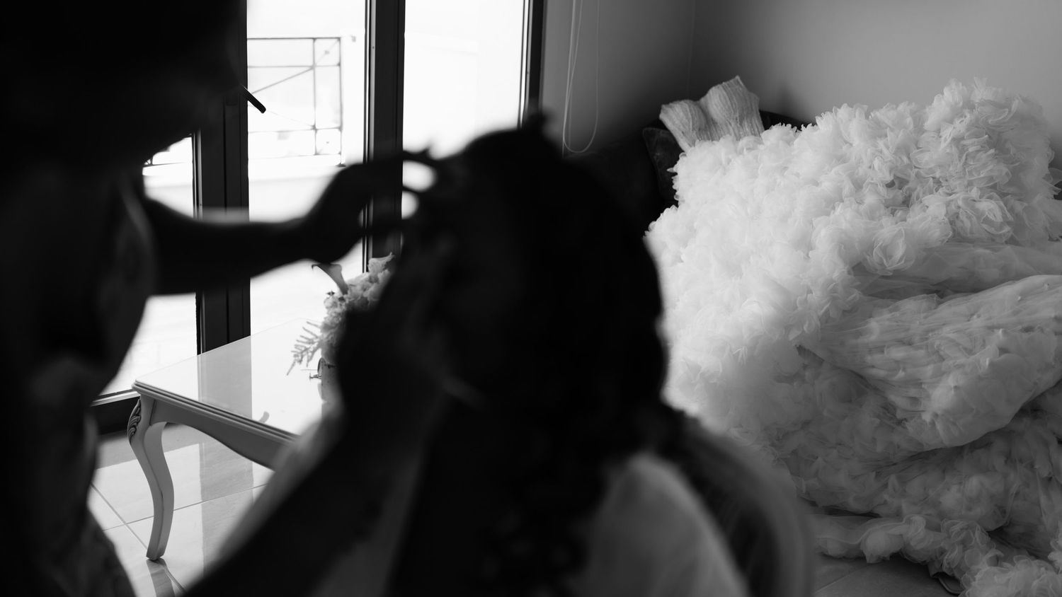 Abstract black and white interior shots with natural window lighting.