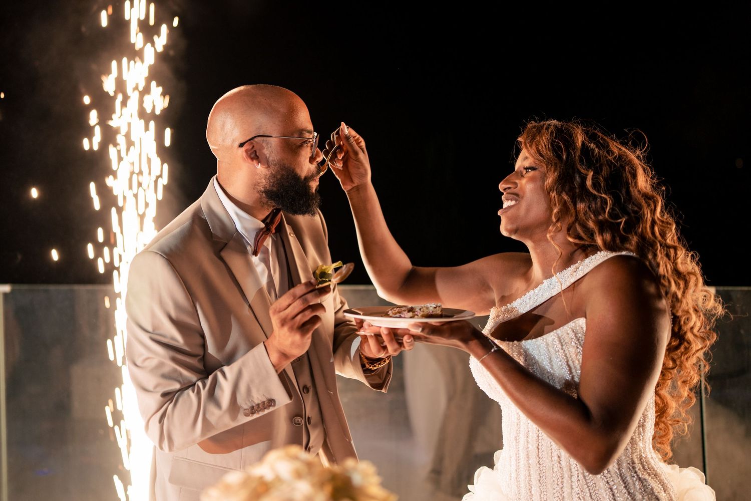 Wedding dance with dramatic sparkler effects creating a magical atmosphere.