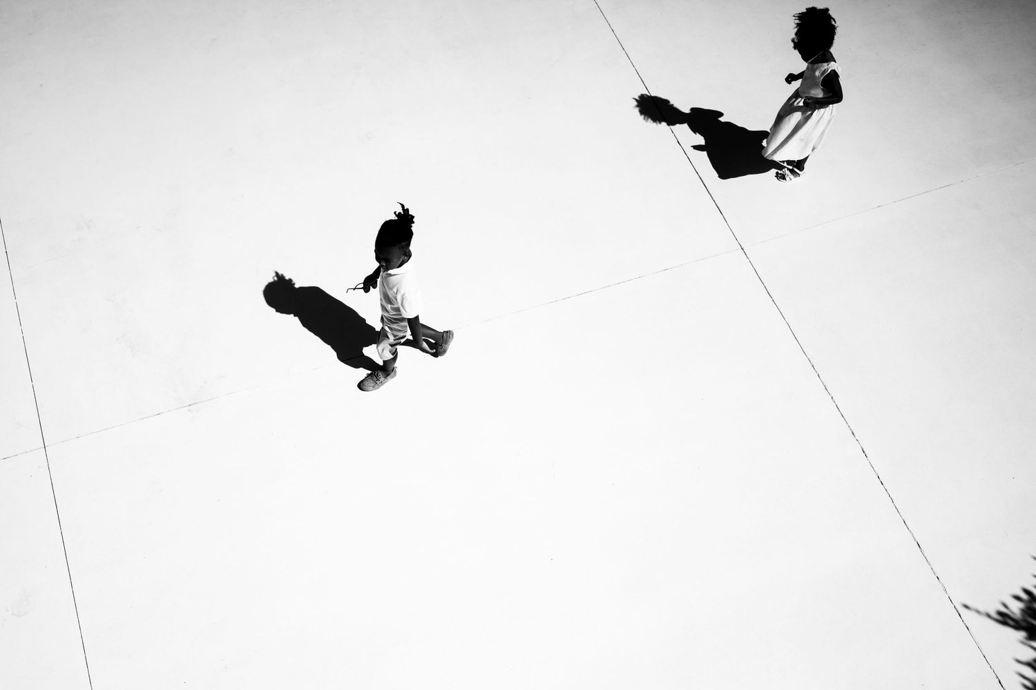 High contrast black and white sequence showing a climber in motion across multiple frames.