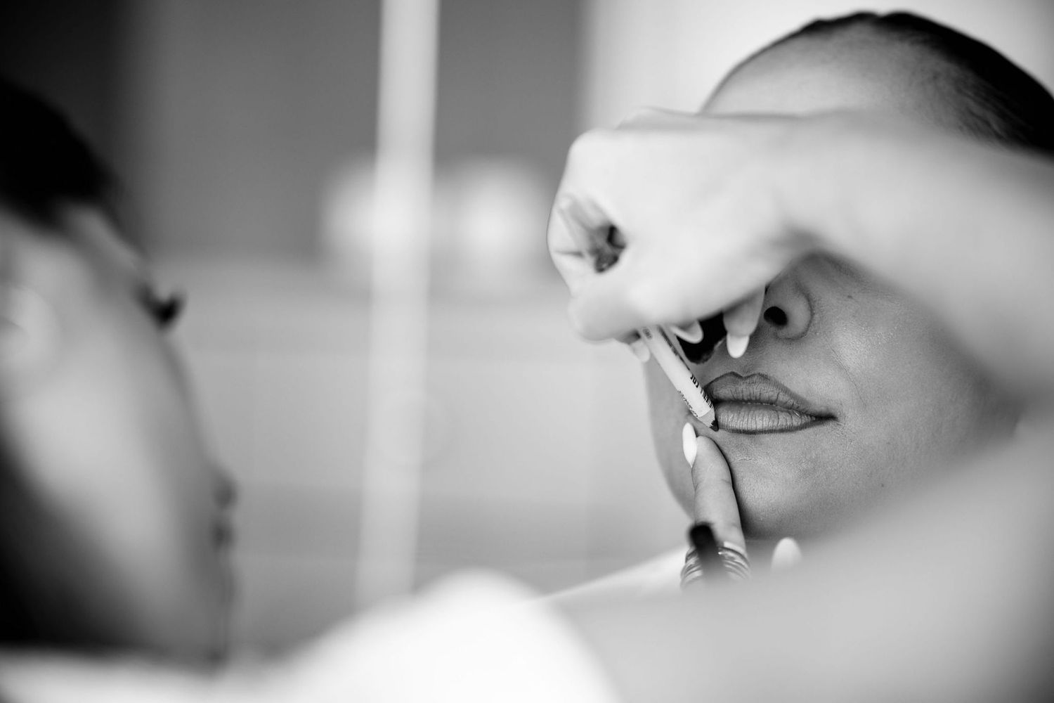 Black and white close-up artistic photography of styling preparation.
