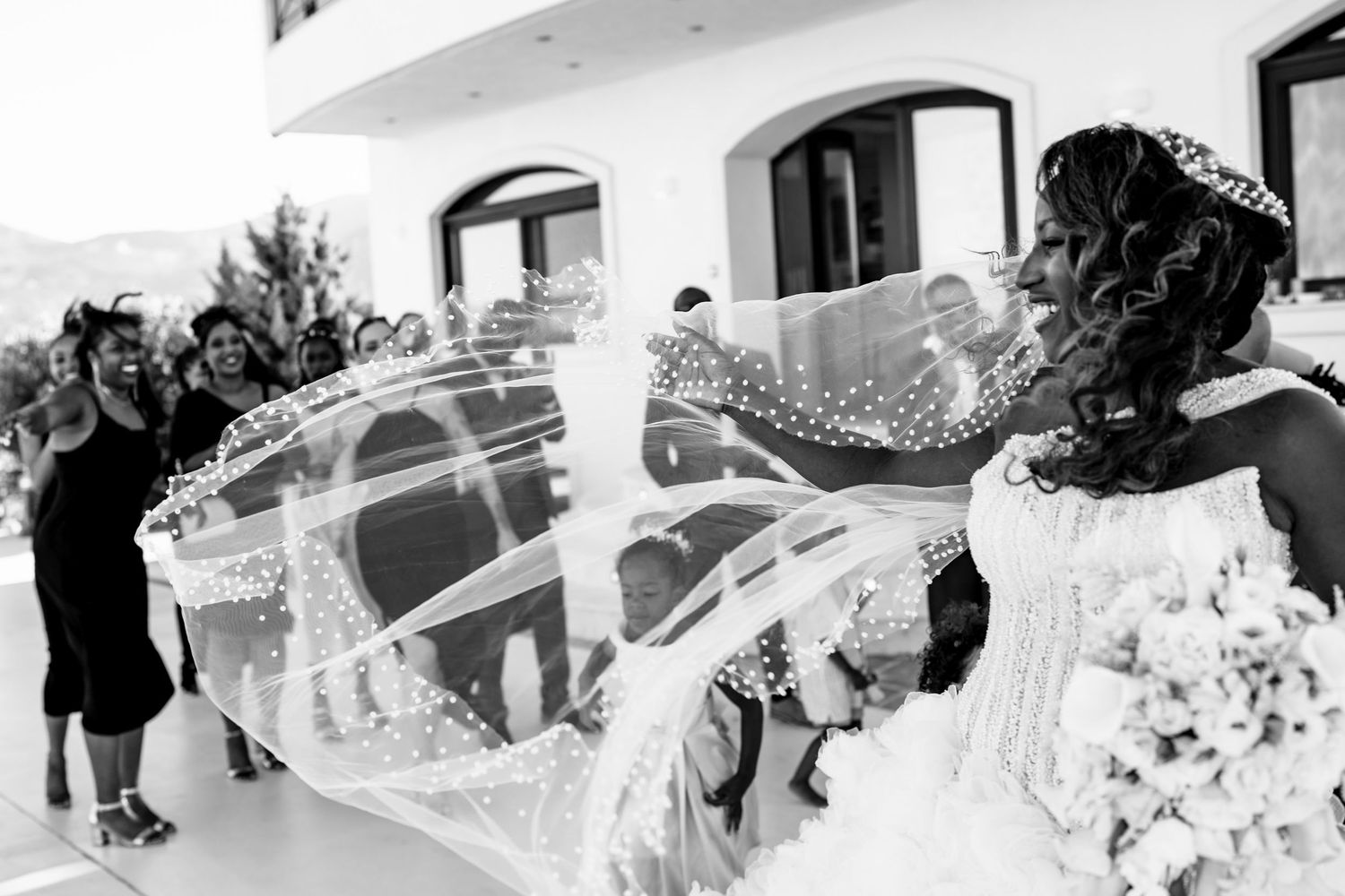 Wedding celebration captured in a series of black and white candid moments.