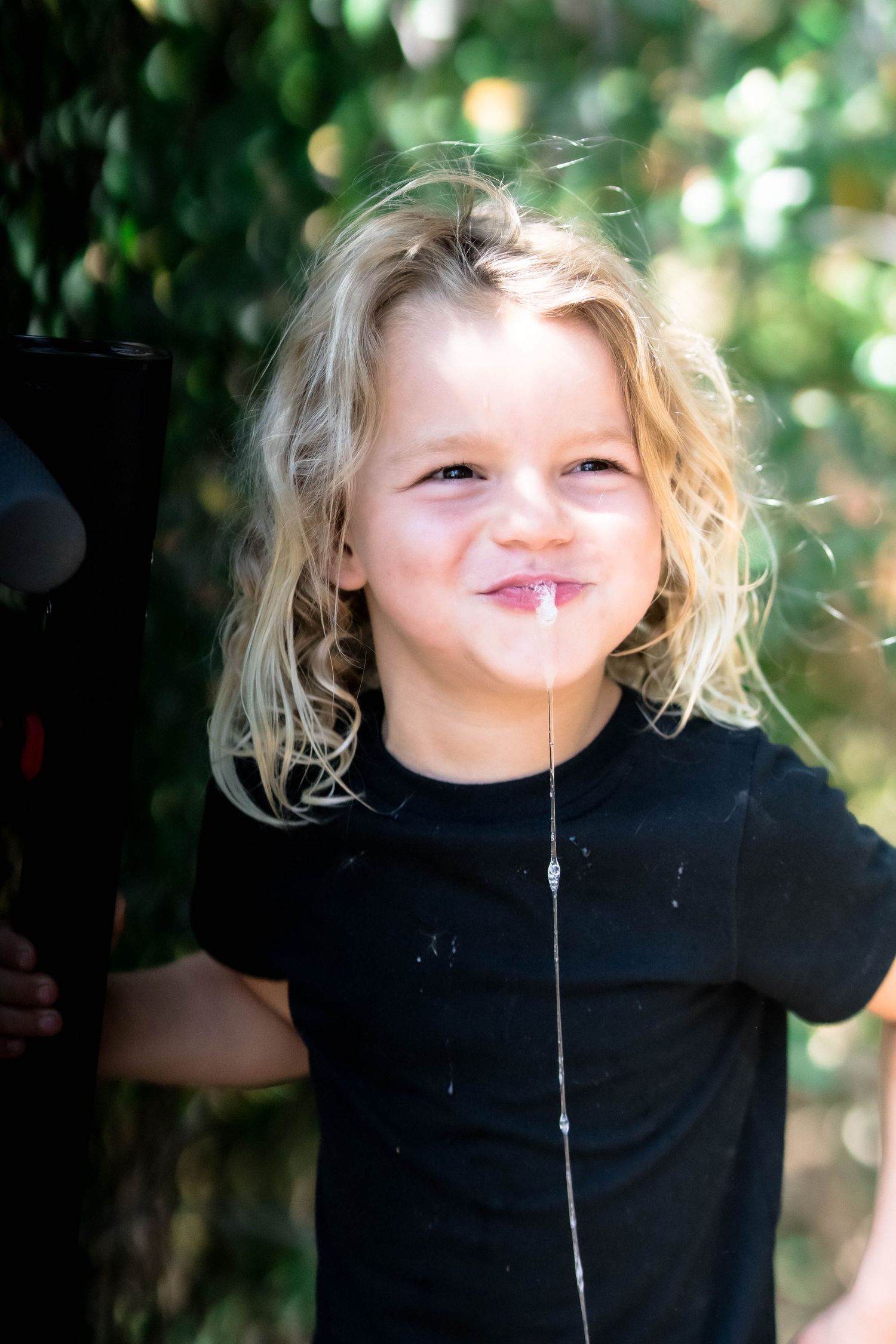 A series of candid moments showing someone blowing bubbles with their mouth.