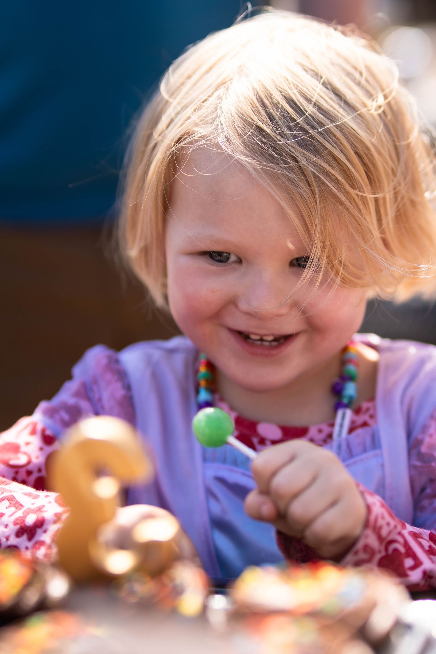 Close-up sequence of someone enjoying playtime with colorful toys.