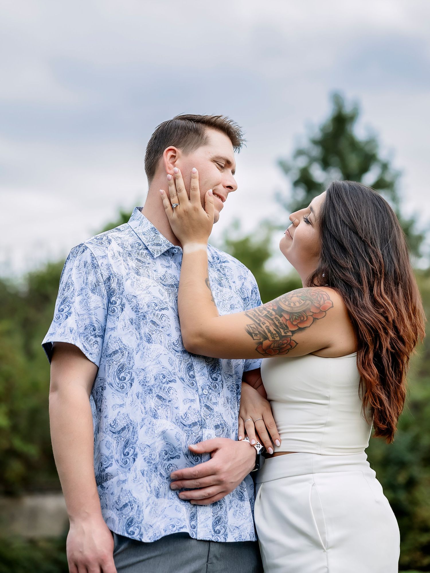 Woman caressing mans face